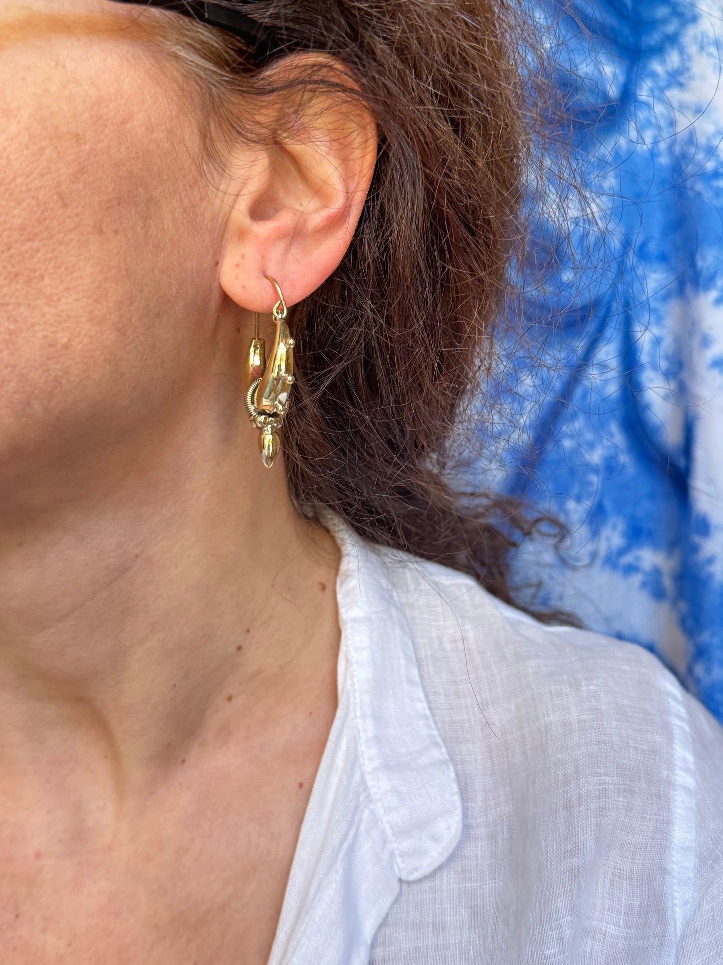 Orecchini boho dorato tribali bombati punta