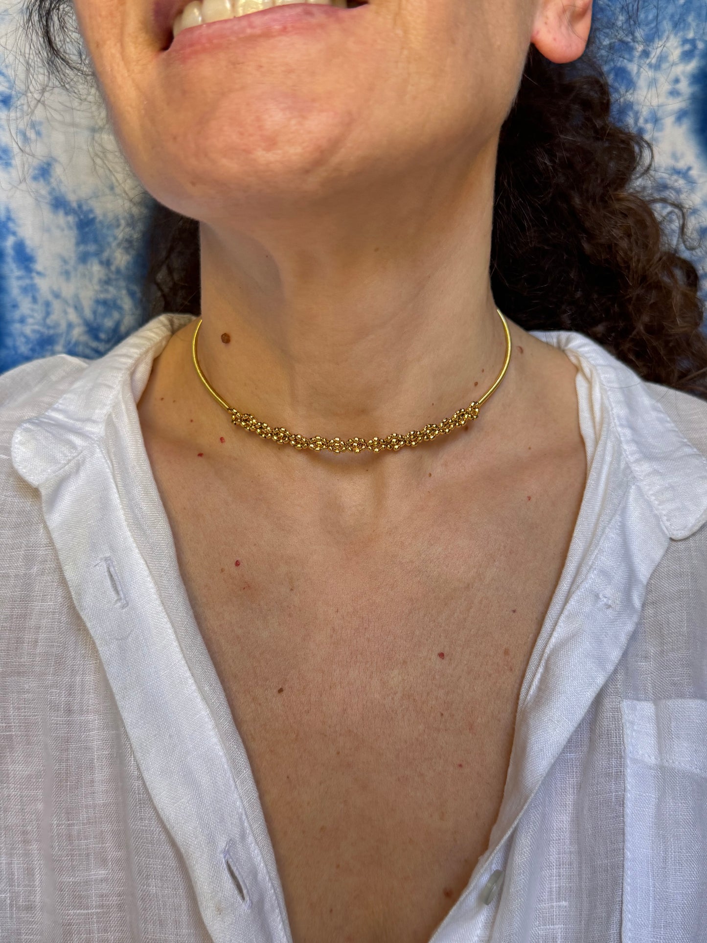 Collarino dorato fiorellini