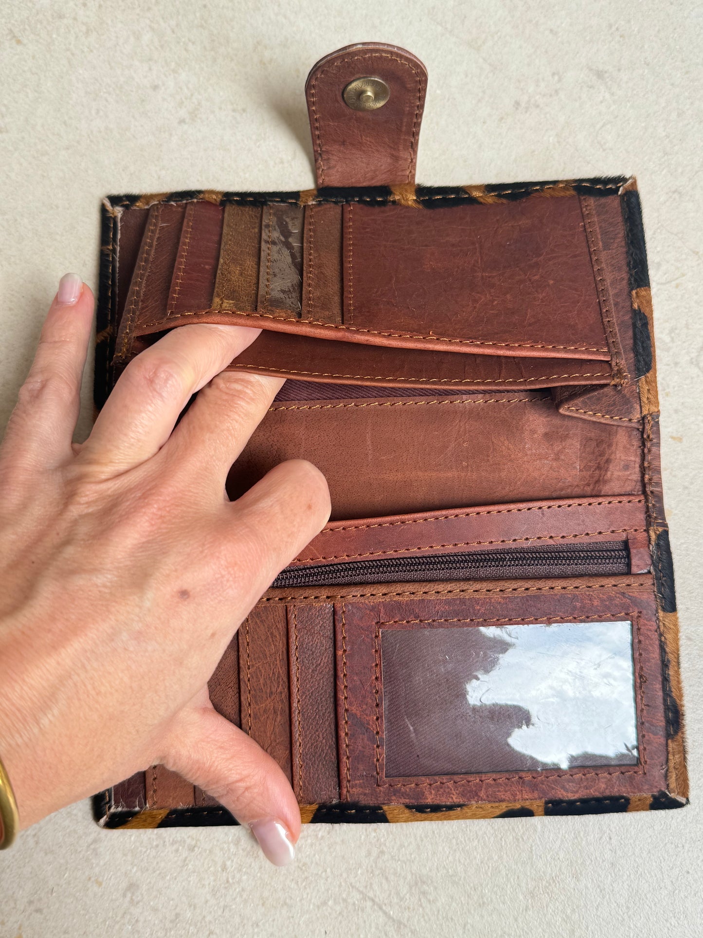 Portafoglio in pelle marrone maculata