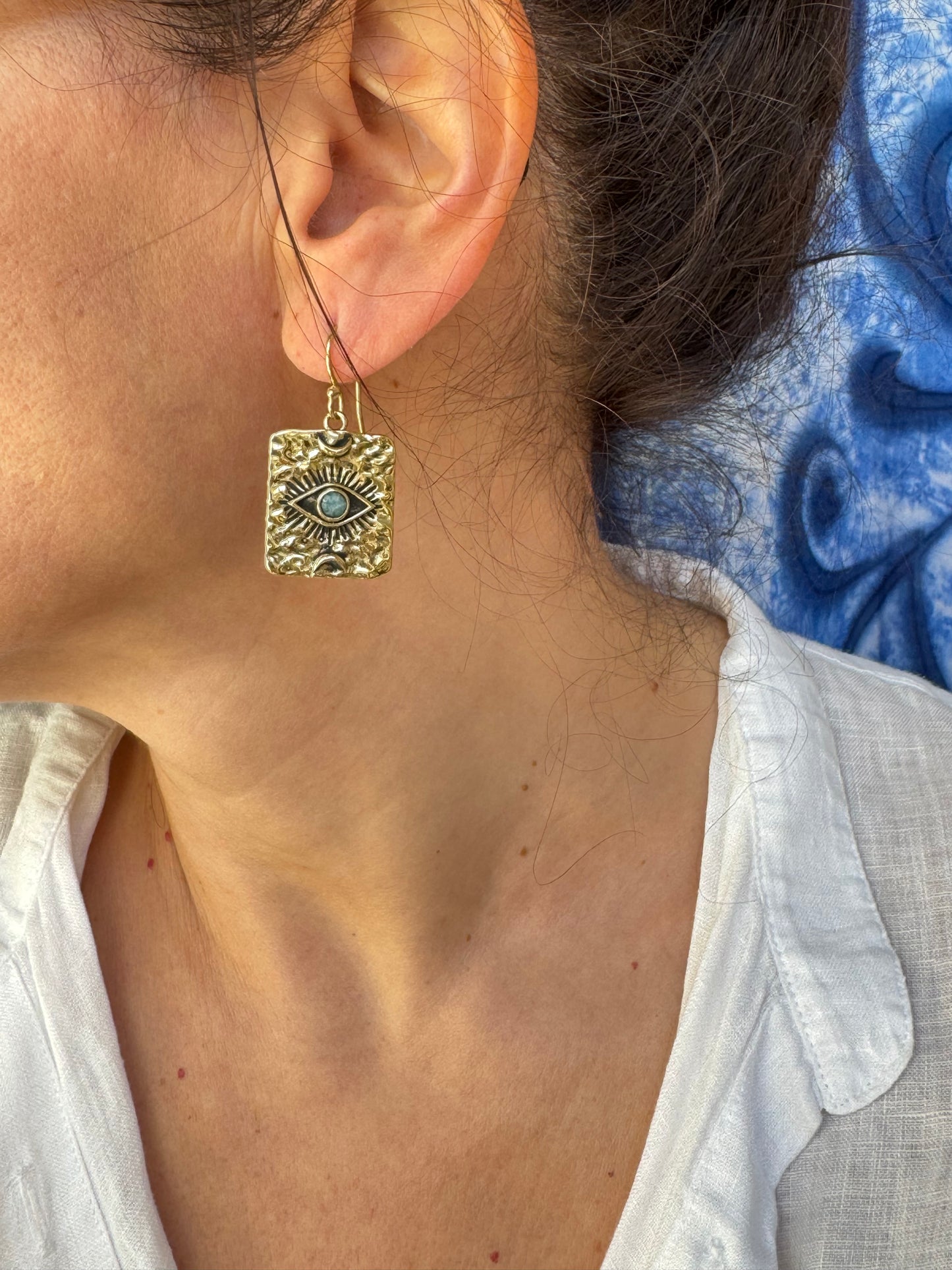 Orecchini boho dorato occhio celeste