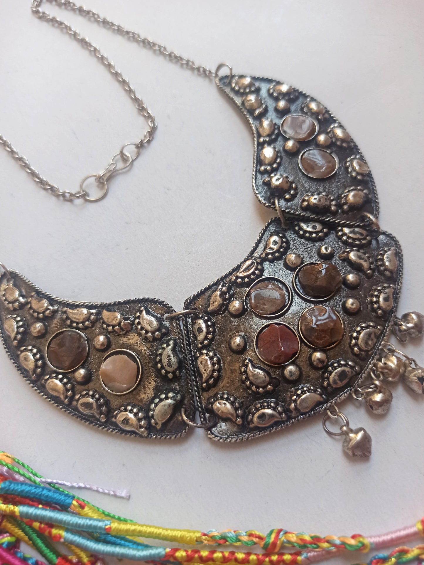 Silver bib necklace with stones