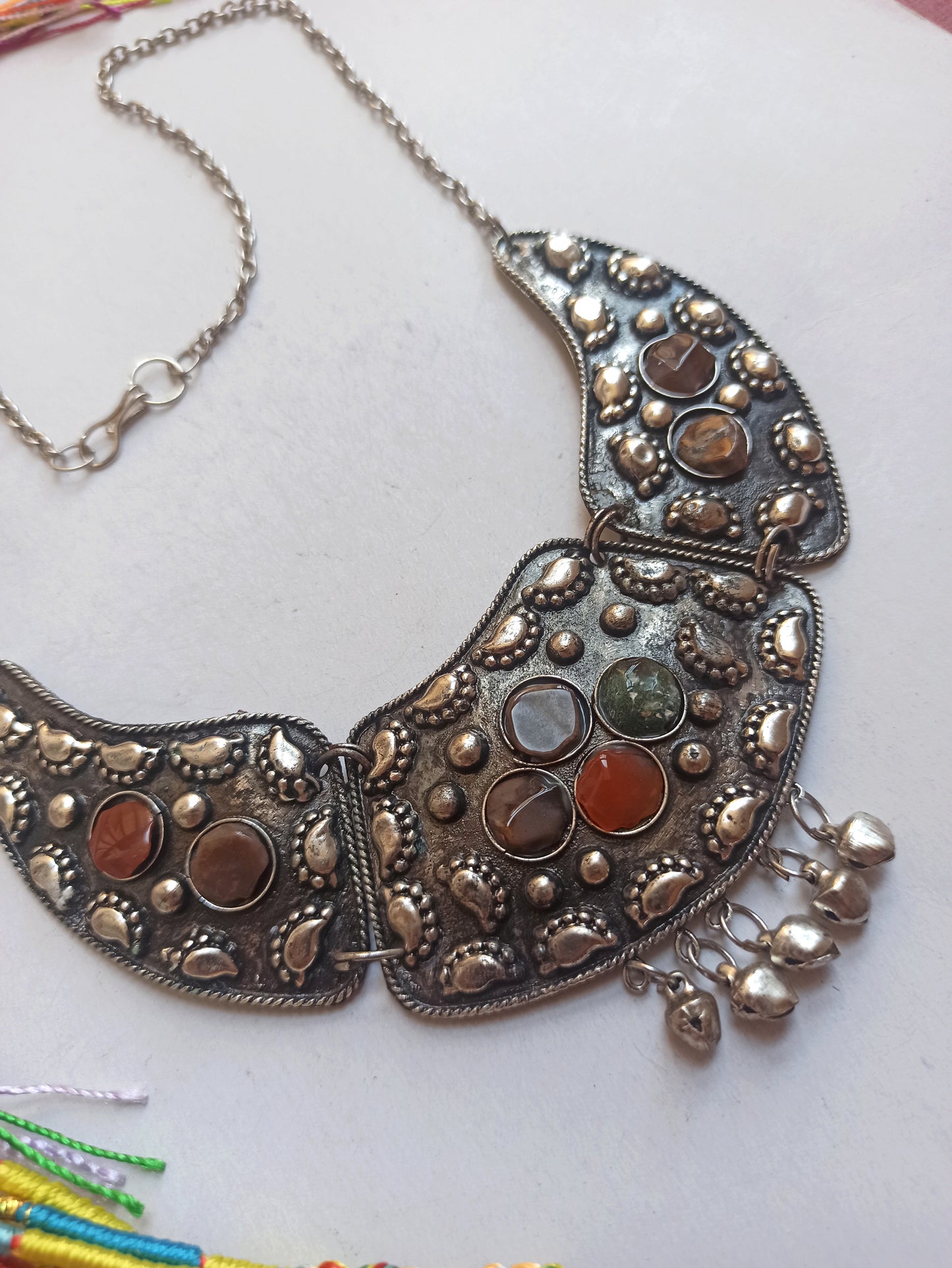 Silver bib necklace with stones