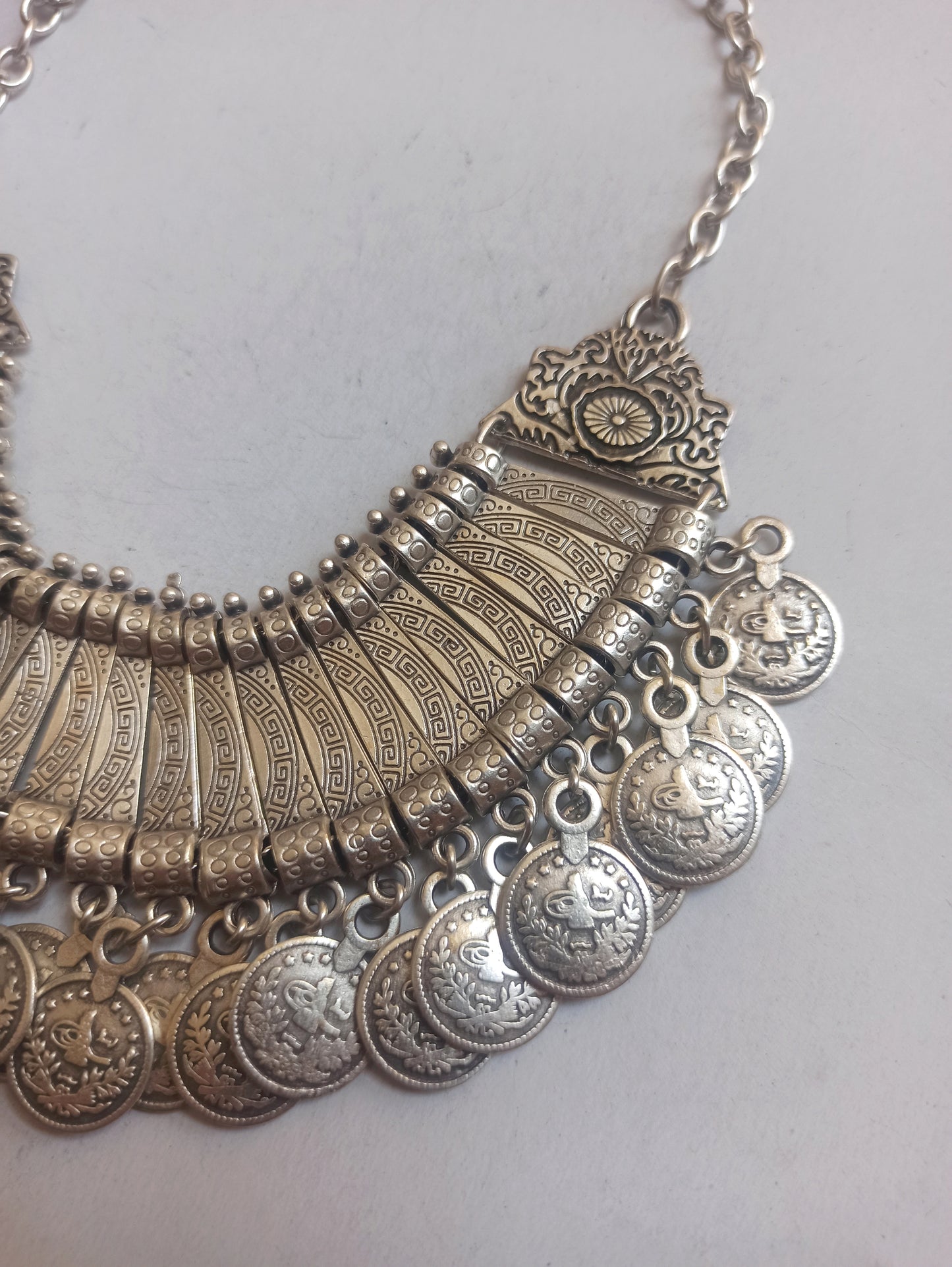Zamak coin level 1 bib necklace