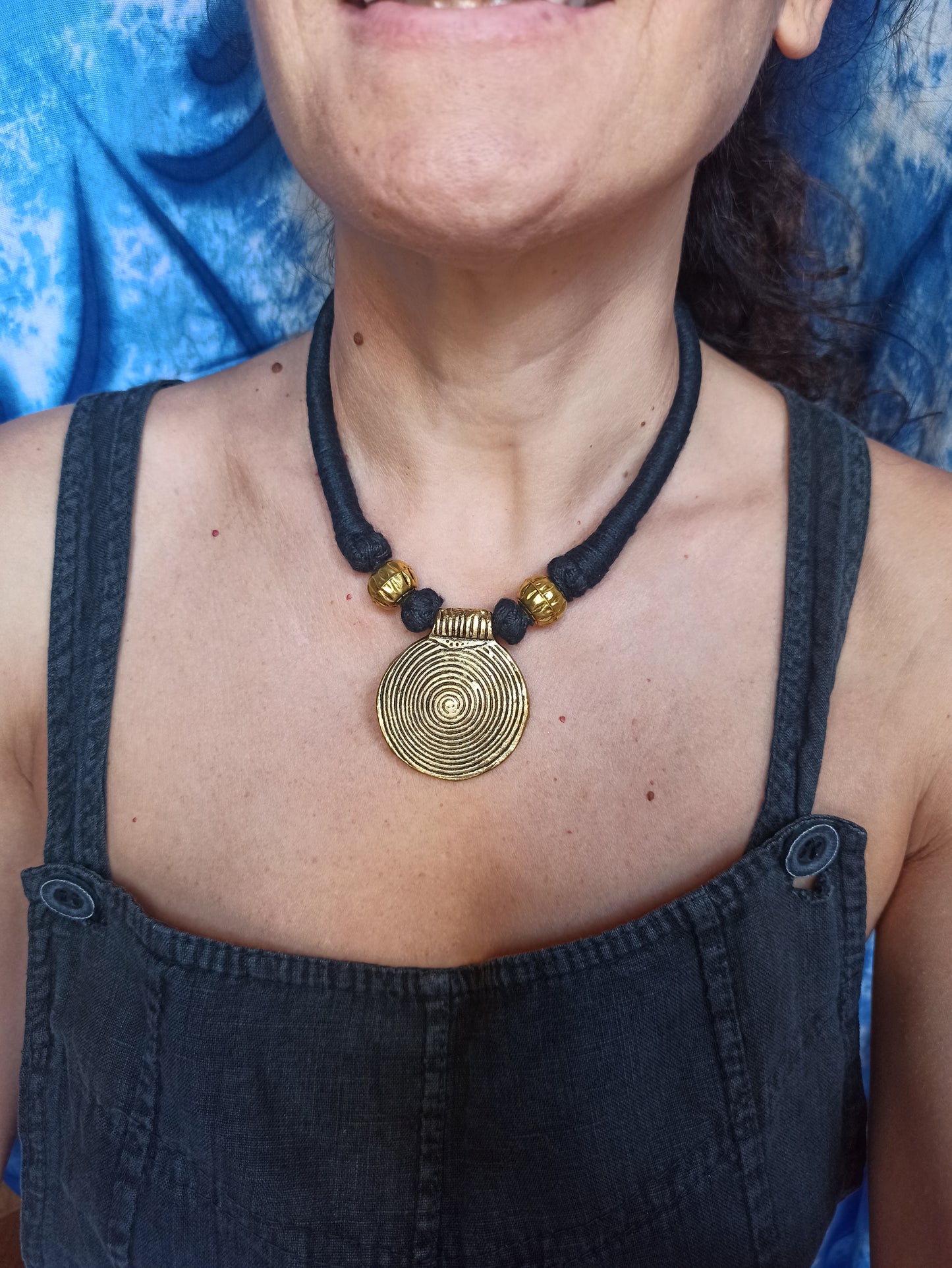 Black necklace gold medallion