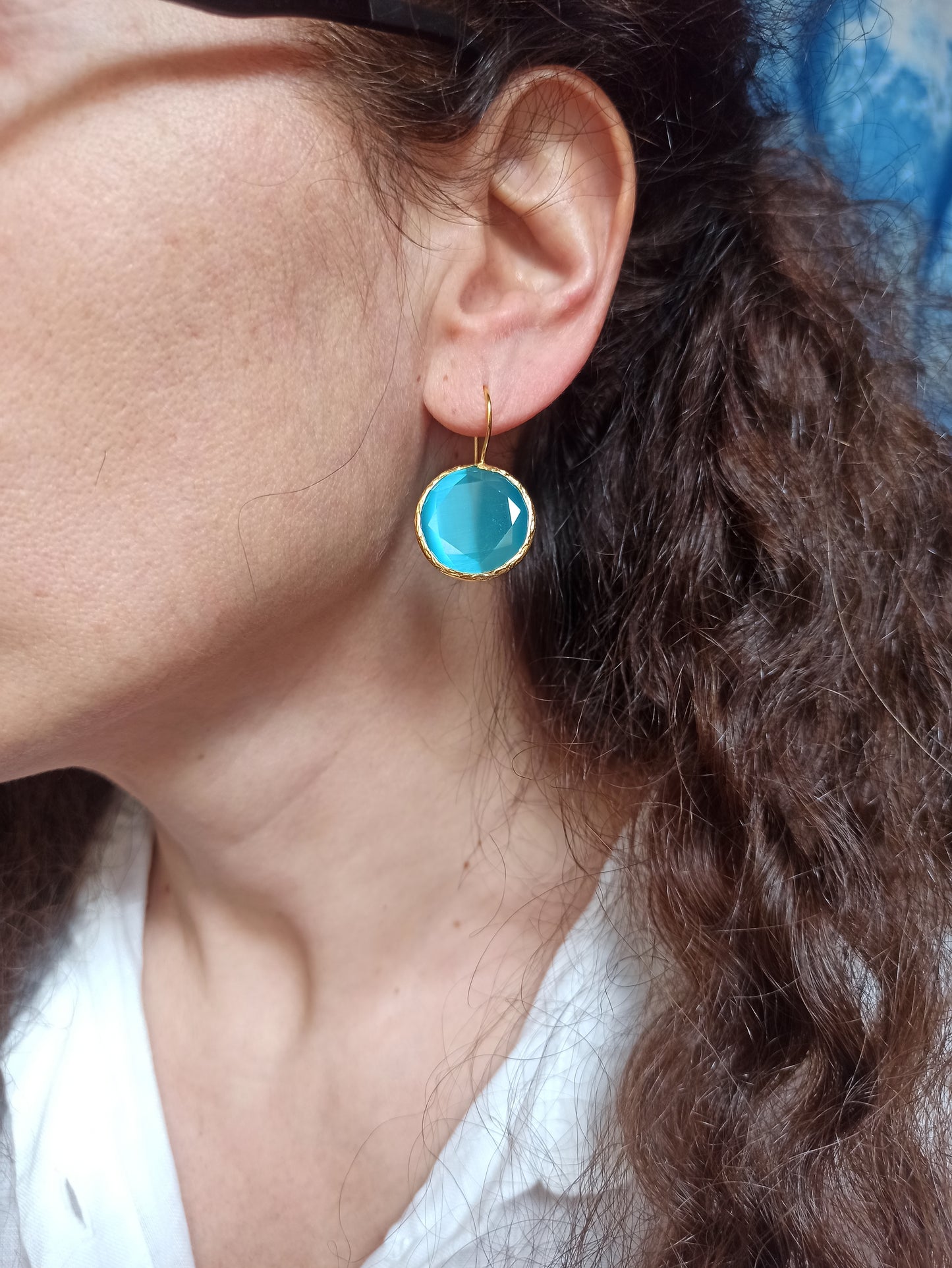 Round light blue stone earrings
