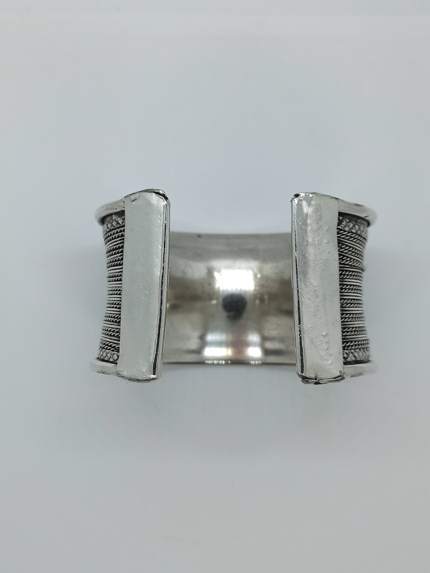 Multi-string silver bangle bracelet