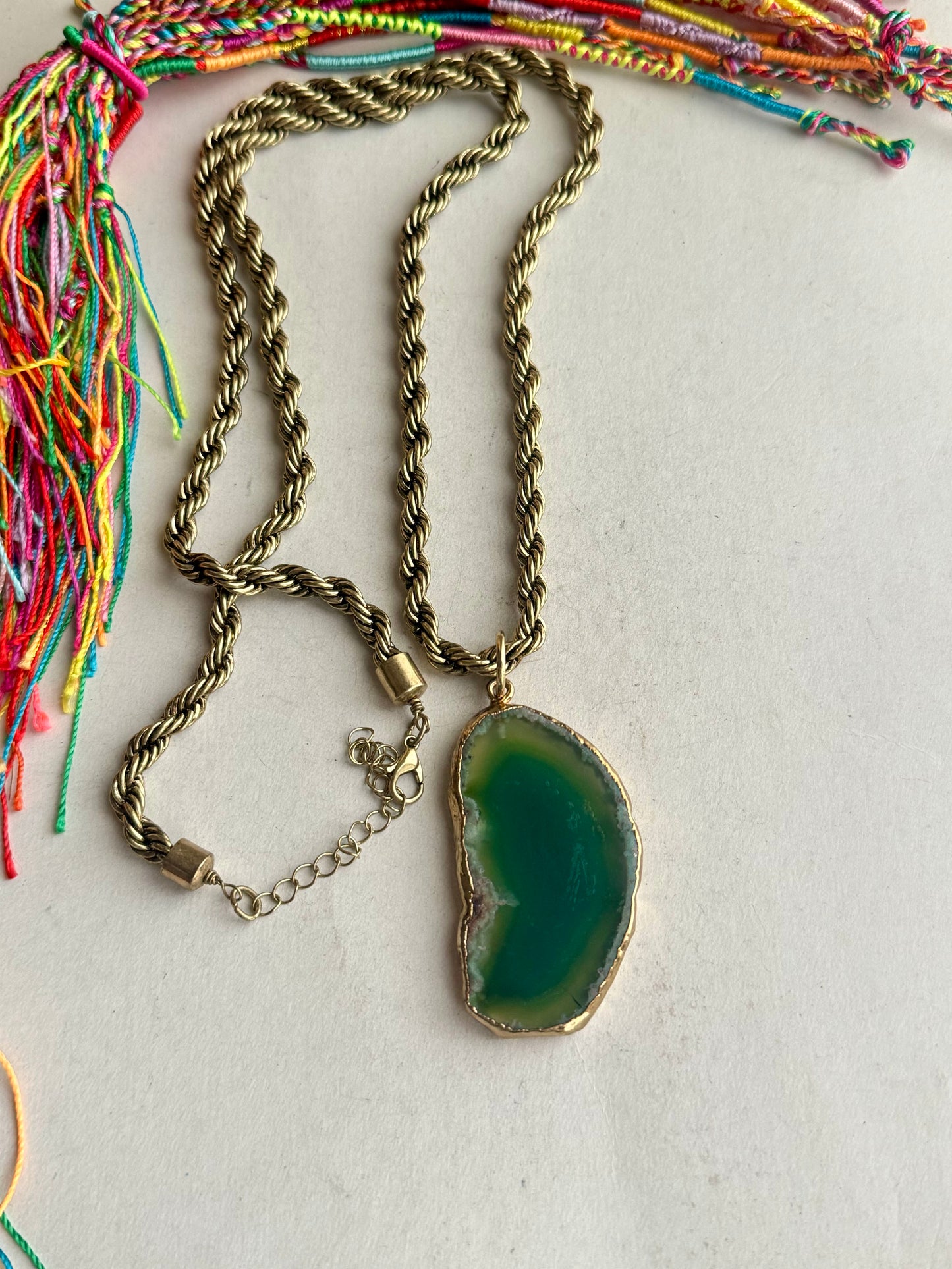 Long golden necklace with green agate