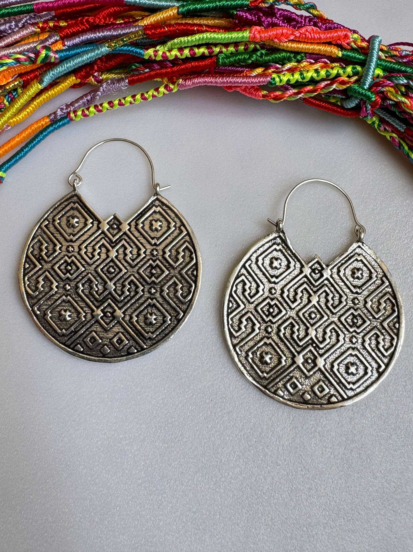 Decorated silver boho earrings