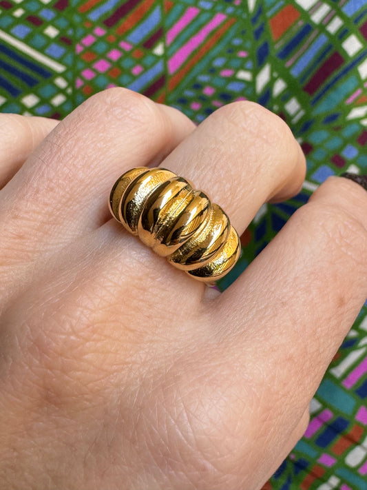 Golden steel ring with domed design