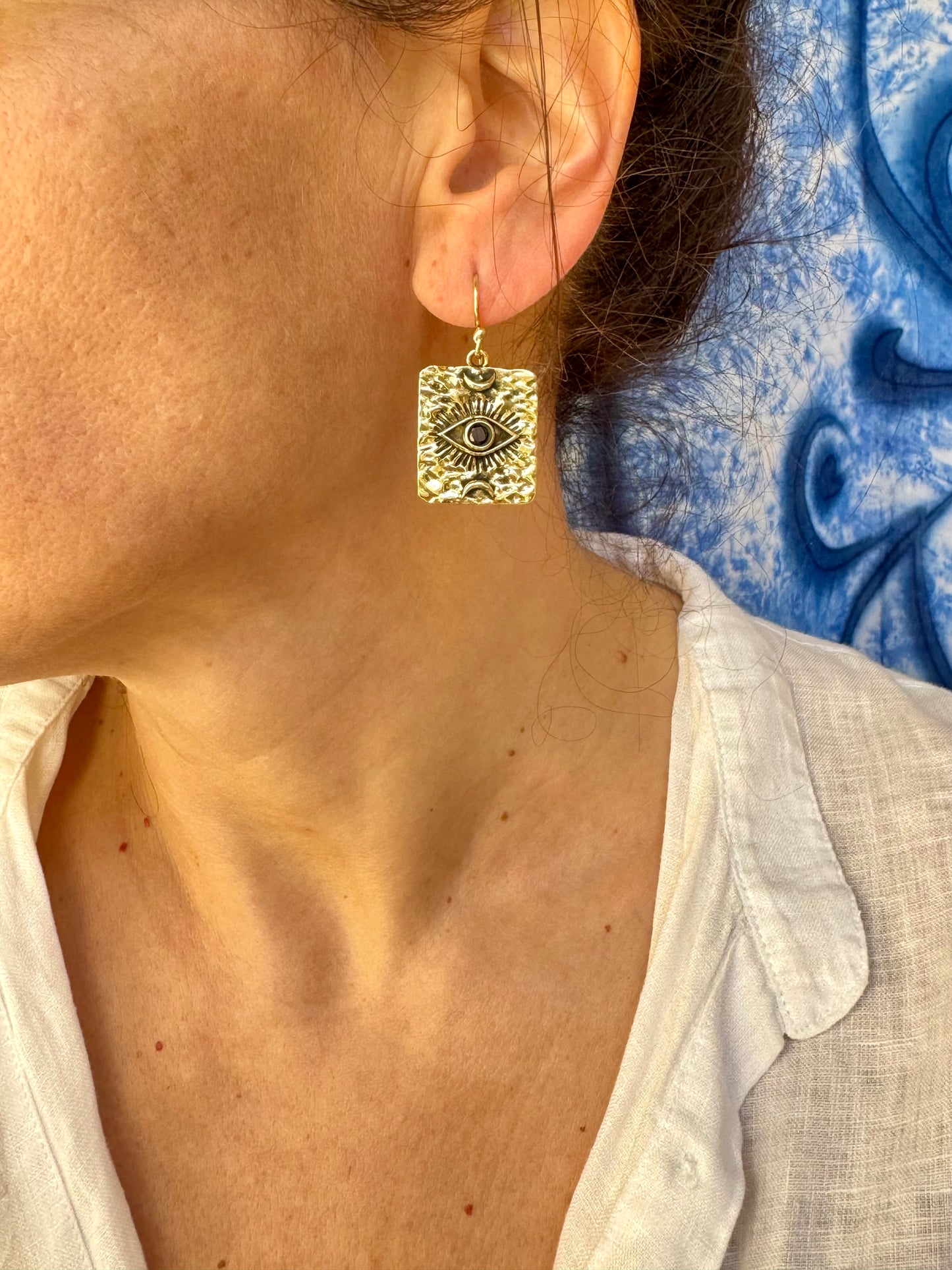 Orecchini boho dorato occhio nero