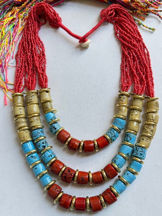 Multi-strand red beaded necklace