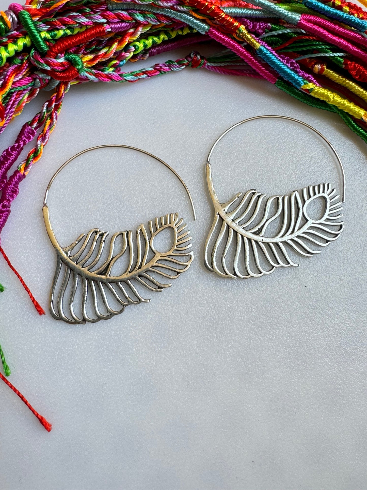 Silver spiral feather boho earrings