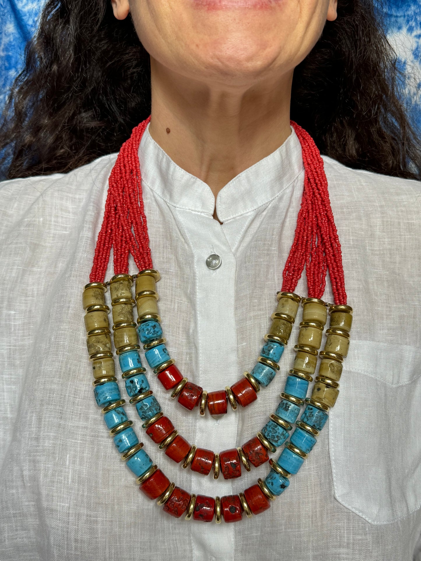 Multi-strand red beaded necklace