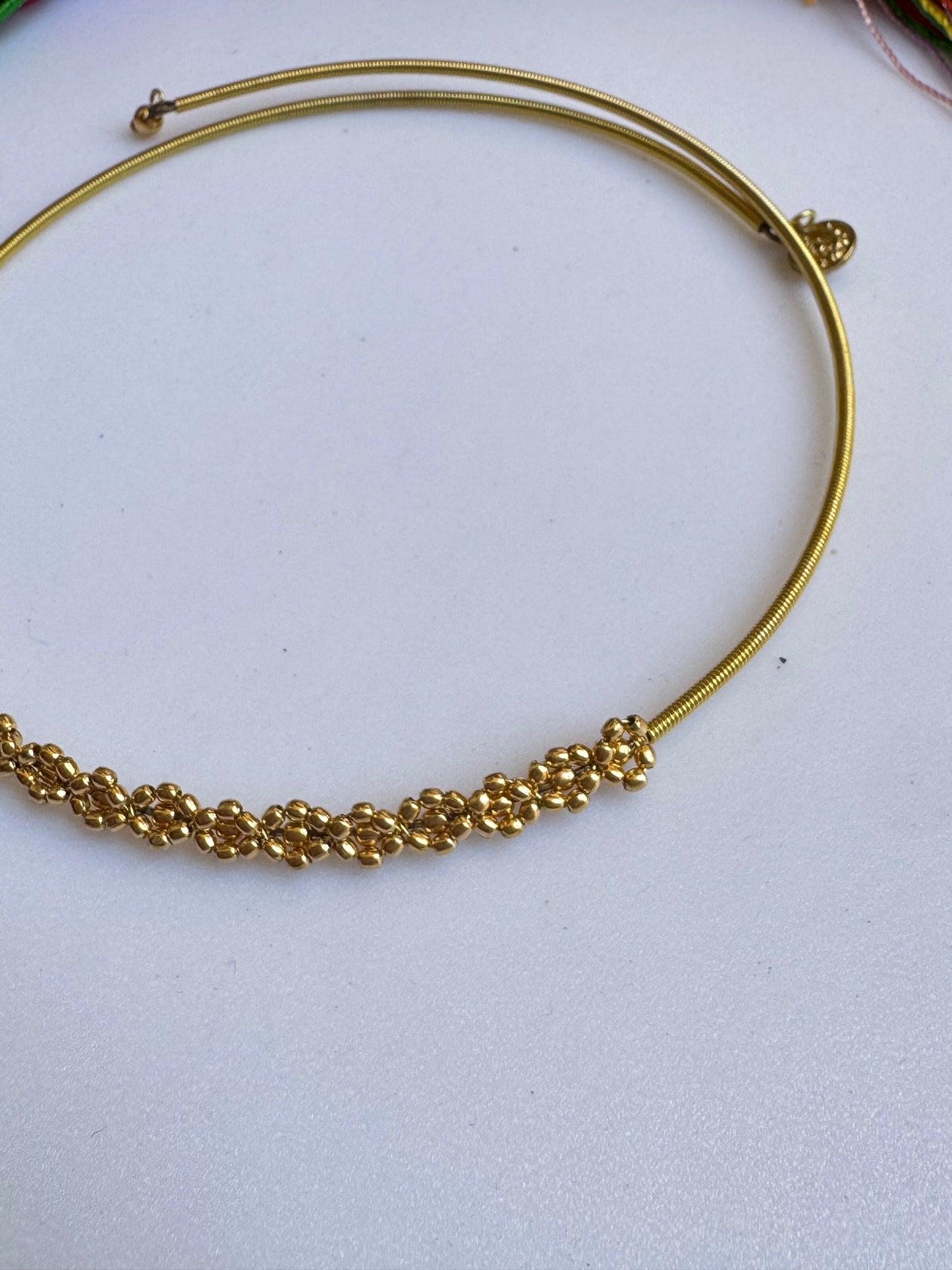 Collarino dorato fiorellini