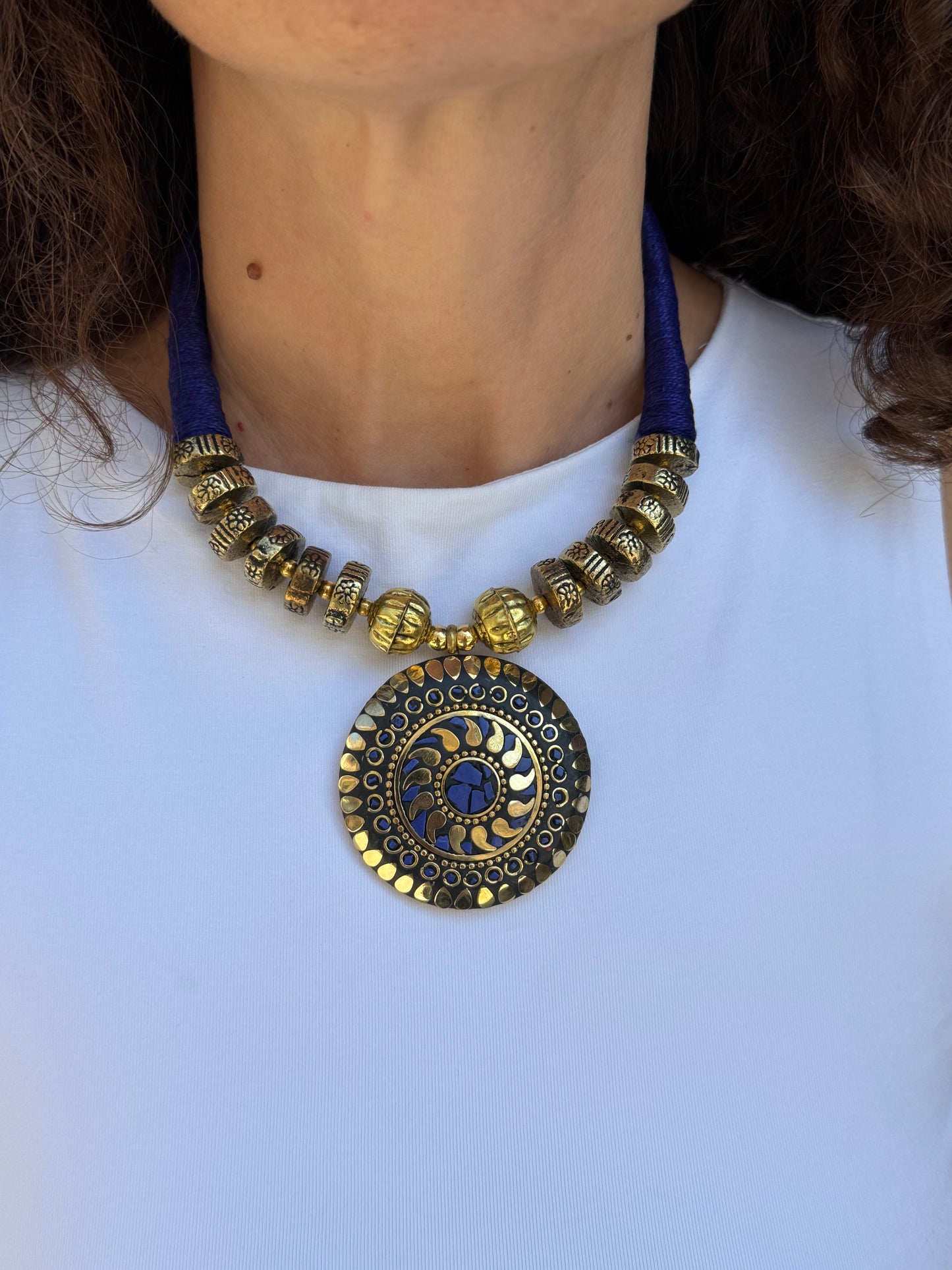 Long Nepalese necklace with blue medallion
