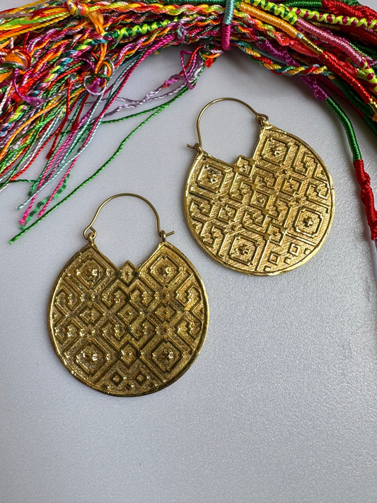 Decorated golden boho earrings