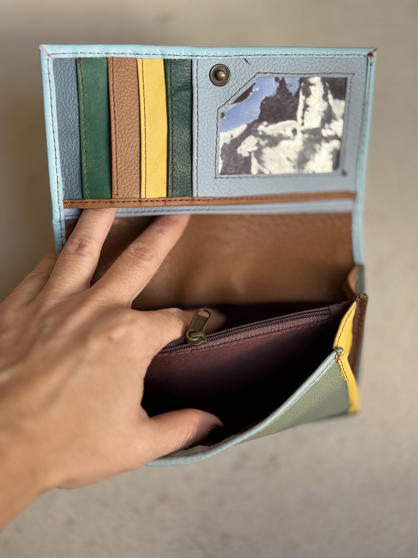 Light blue and green leather wallet