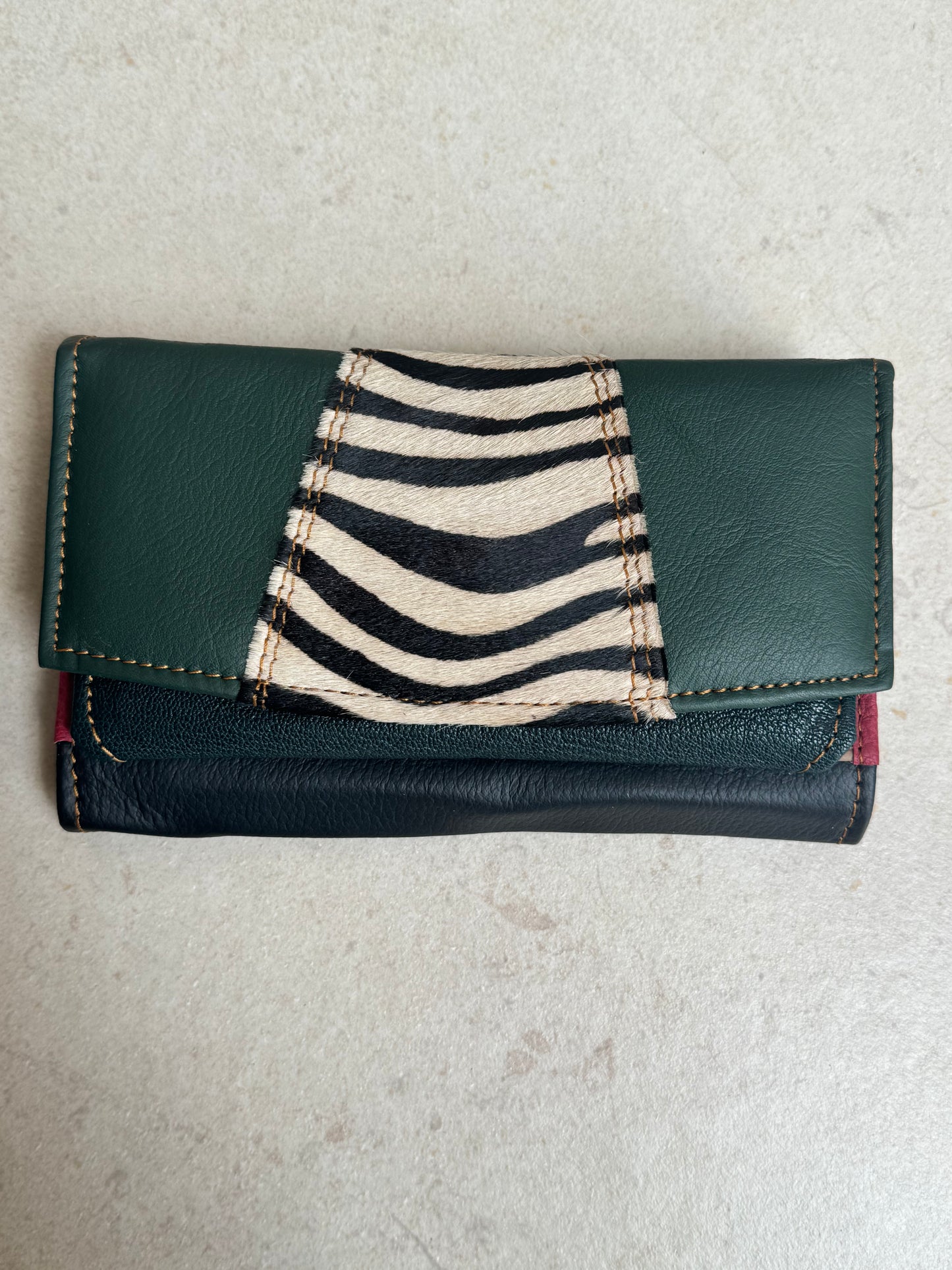 Green and blue spotted leather wallet