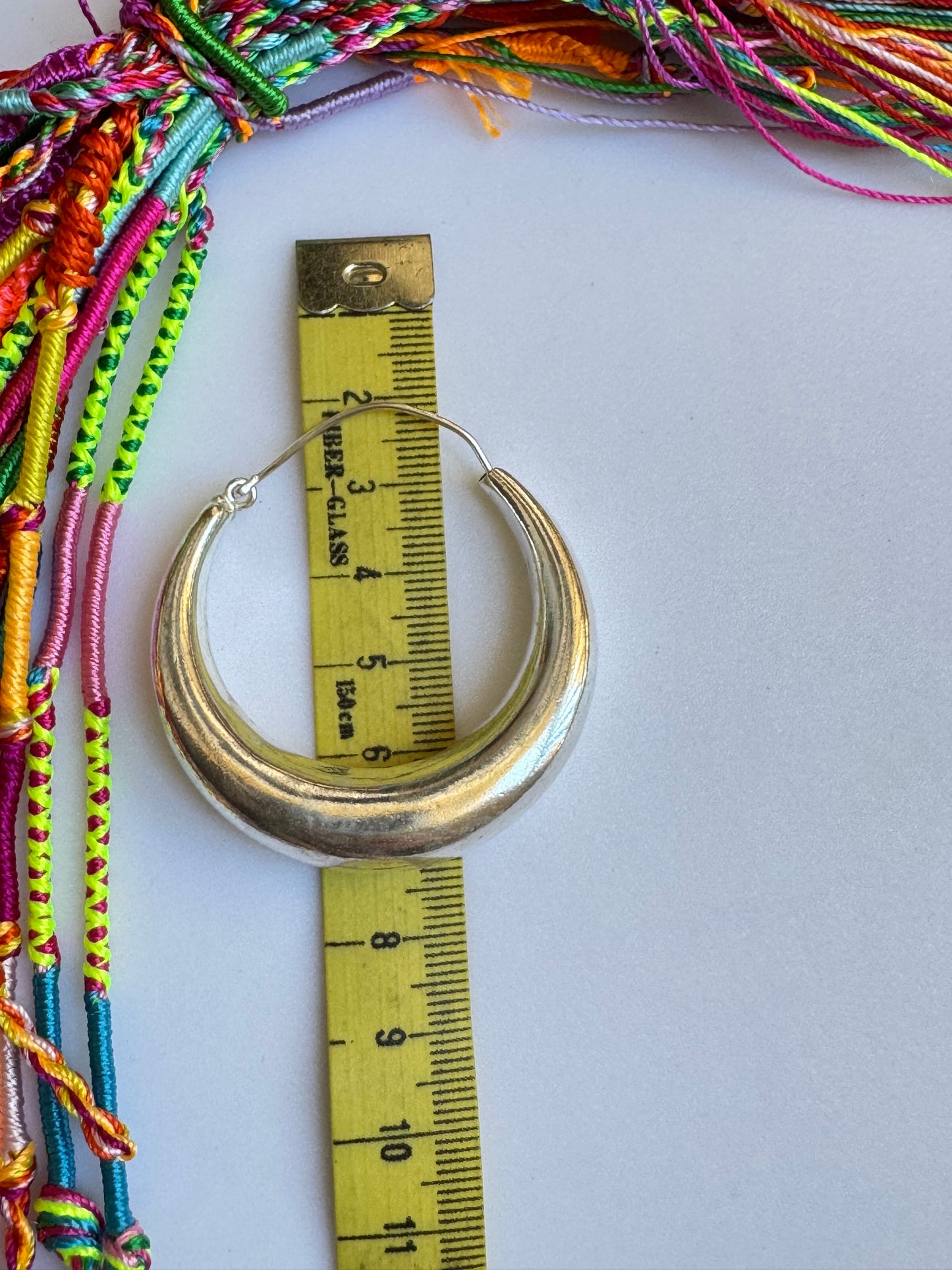 Orecchini boho argentati bombati