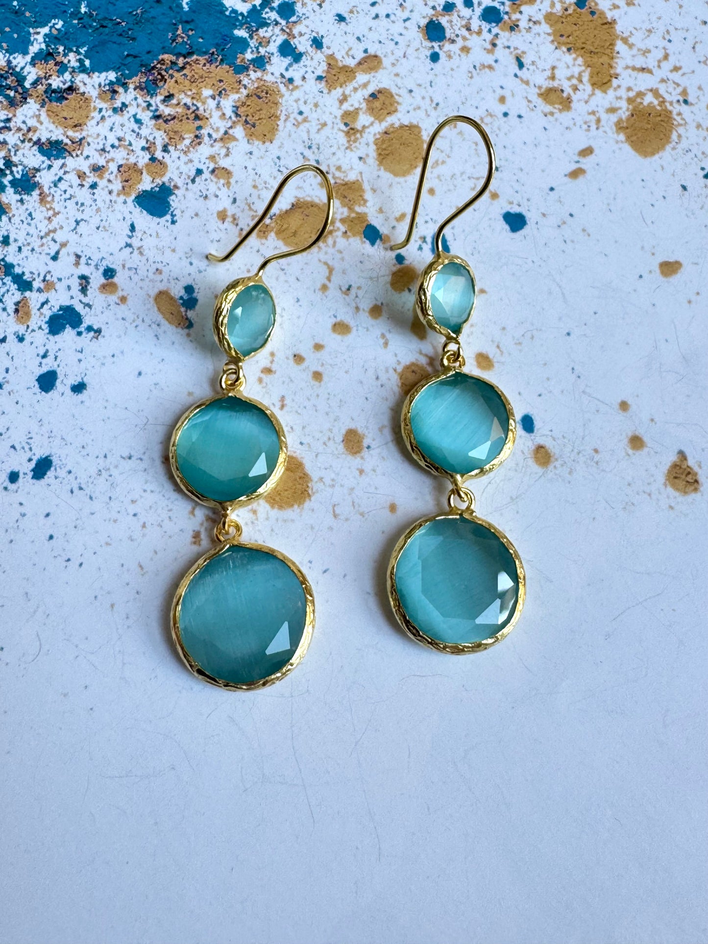 3 stone light blue earrings