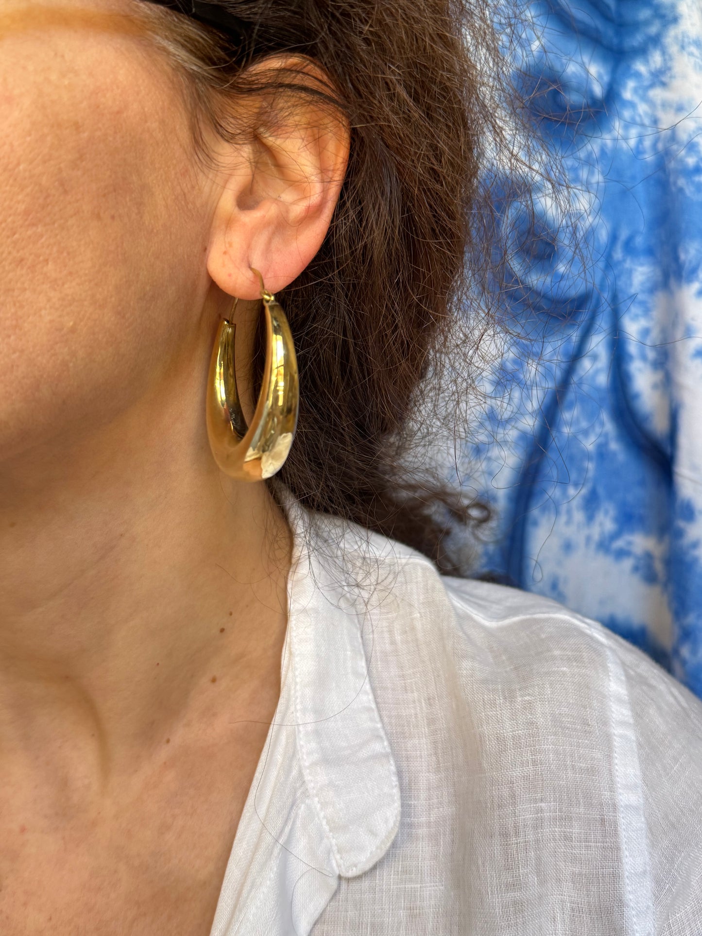 Orecchini boho dorato bombati