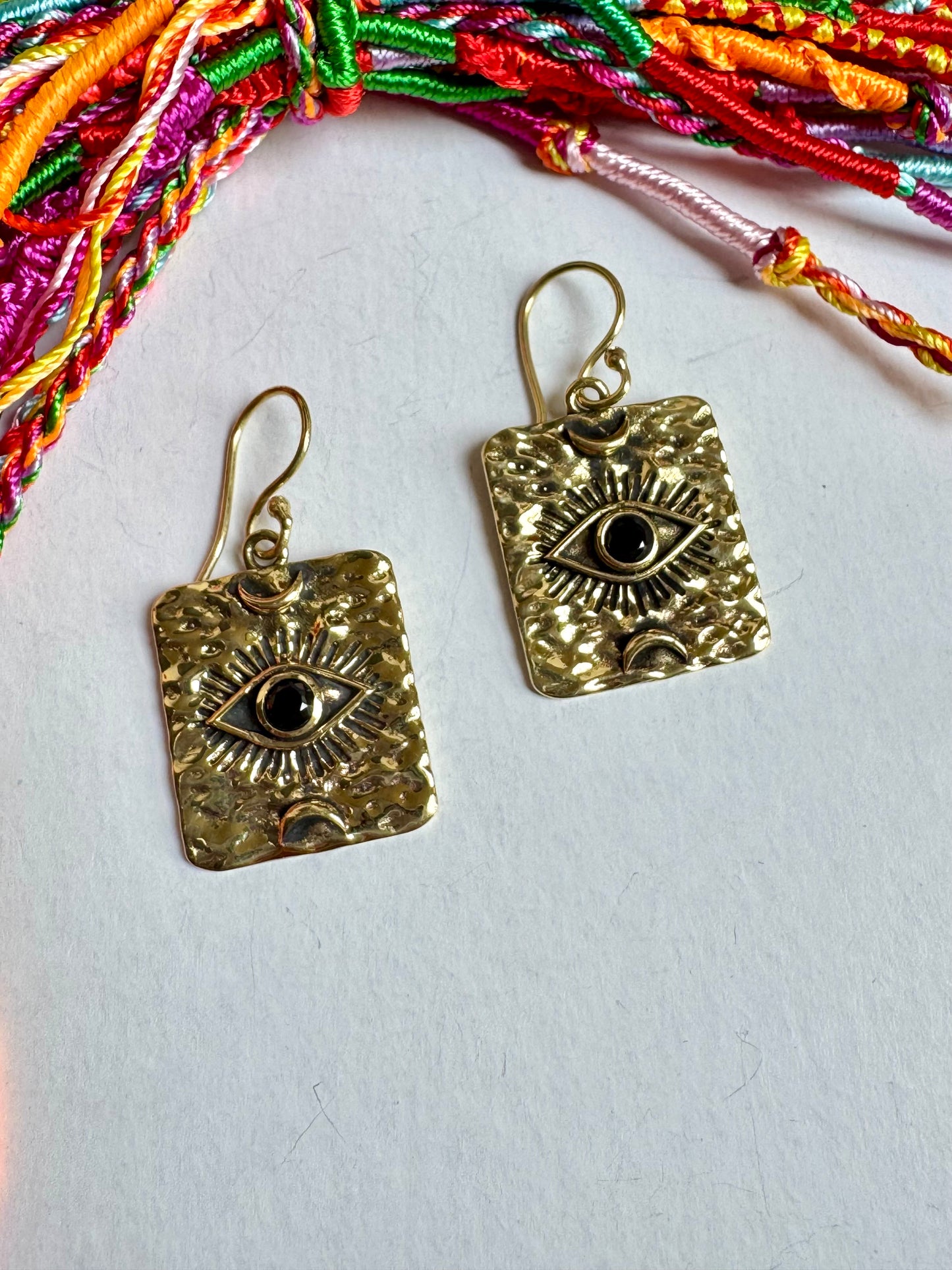 Orecchini boho dorato occhio nero