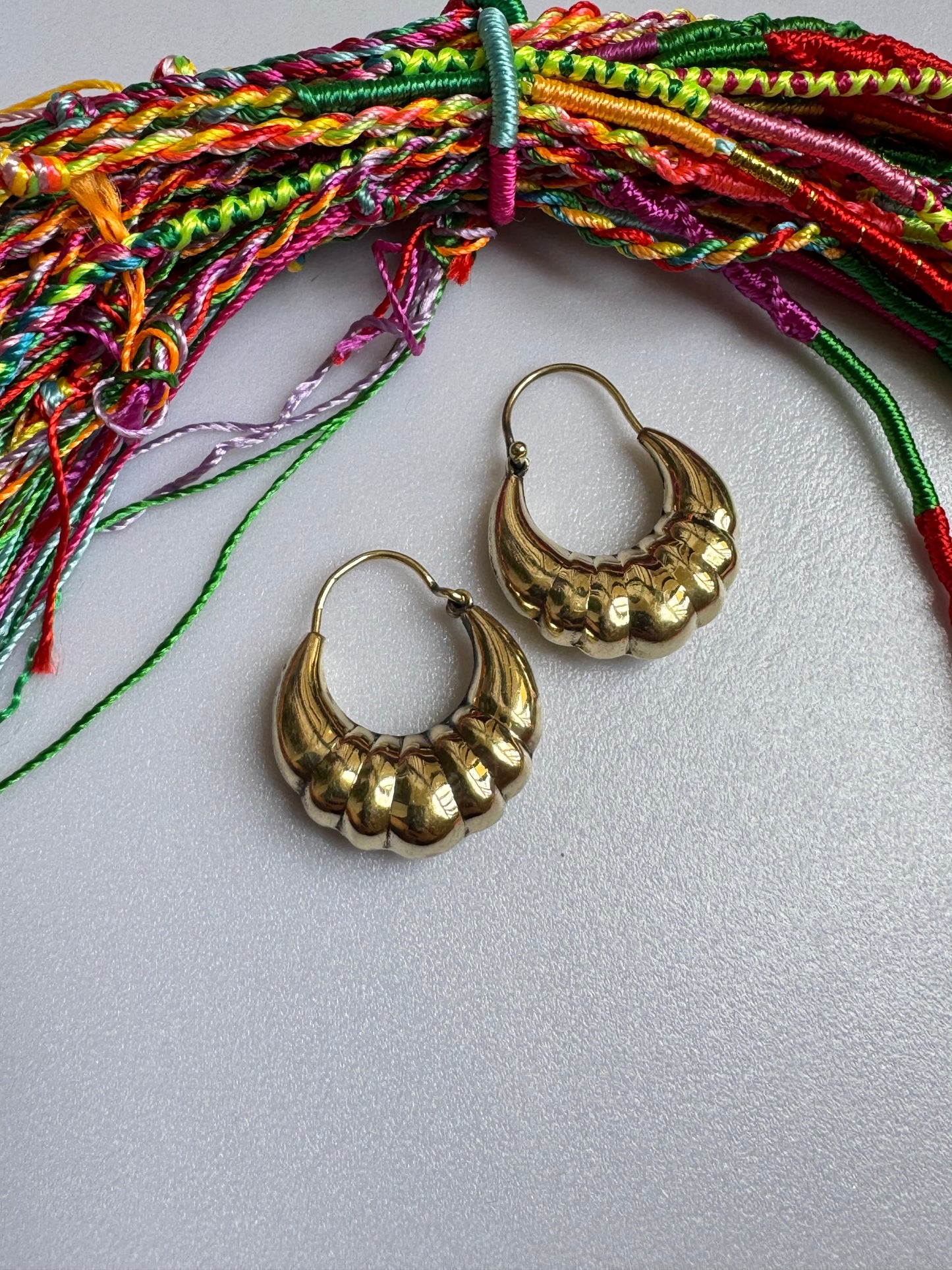 Rounded golden boho earrings