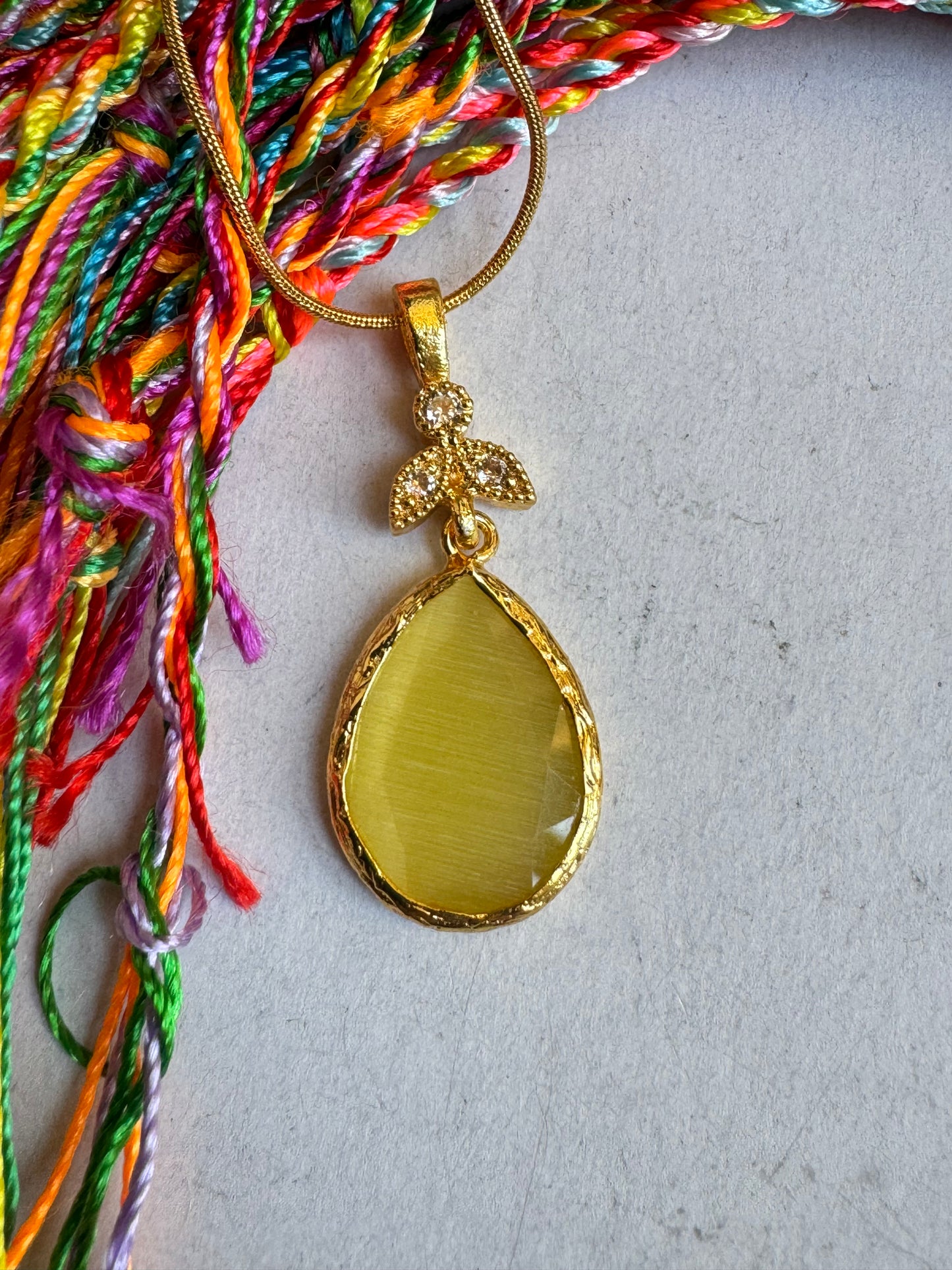 Yellow drop stone pendant