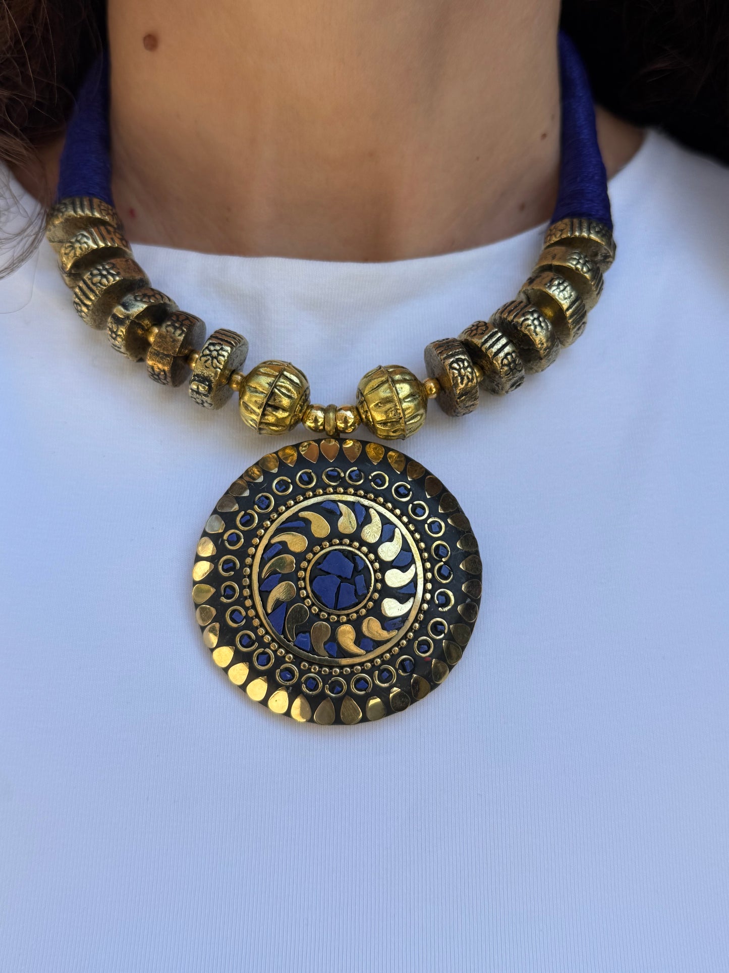Long Nepalese necklace with blue medallion