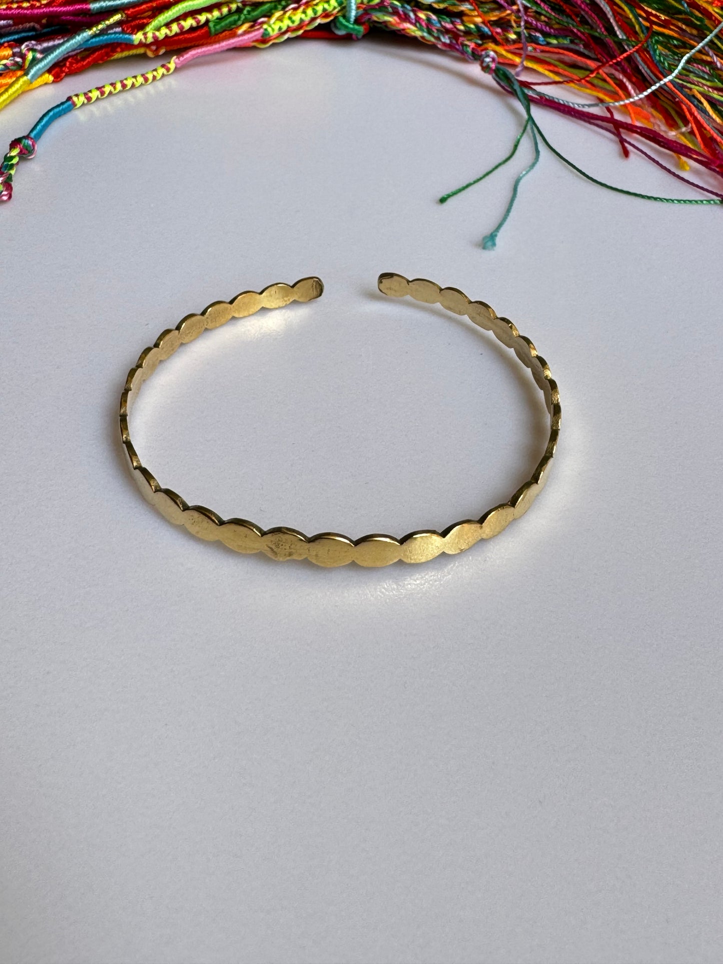 Thin golden waves bangle bracelet