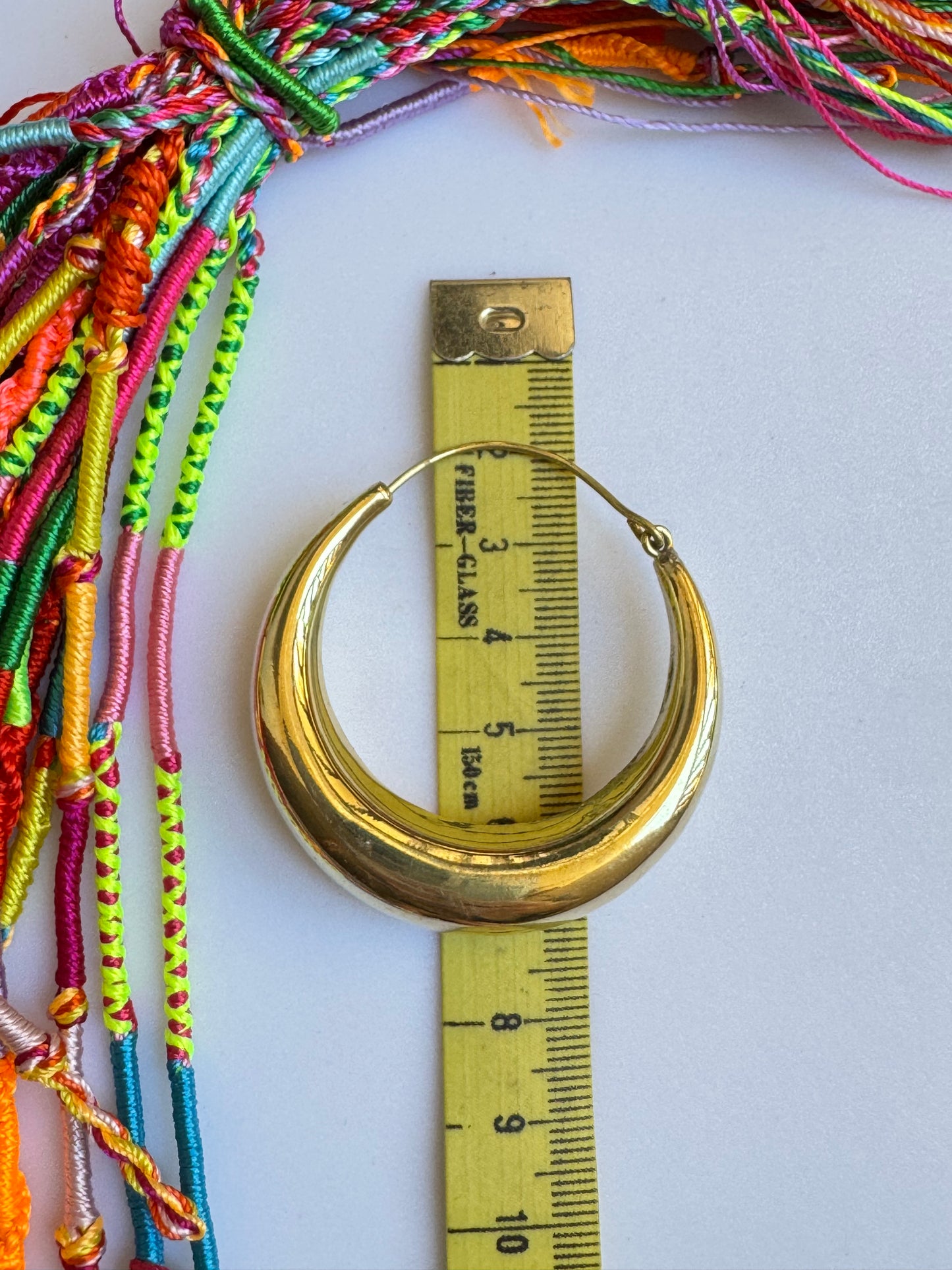 Orecchini boho dorato bombati