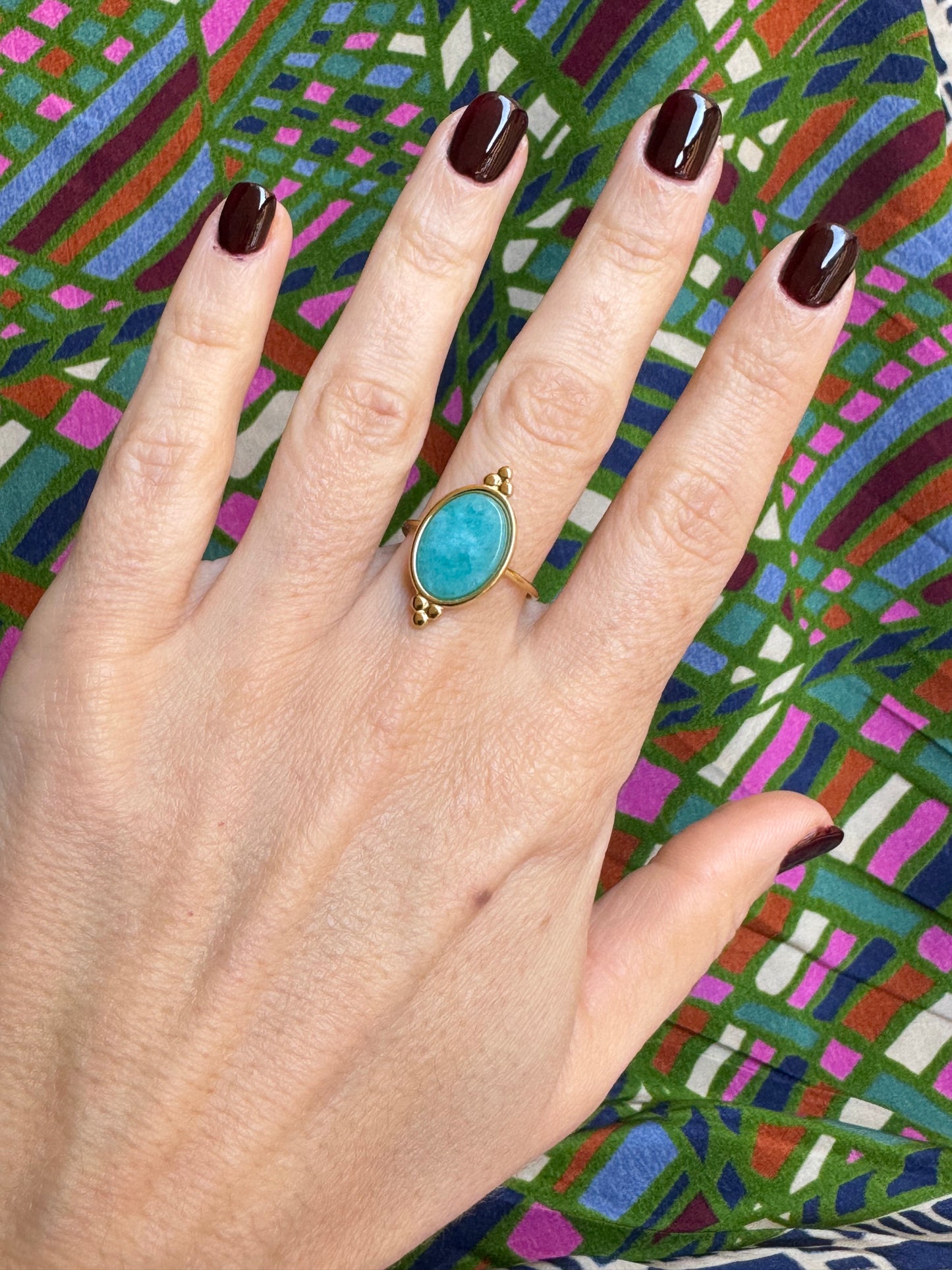 Turquoise golden steel ring