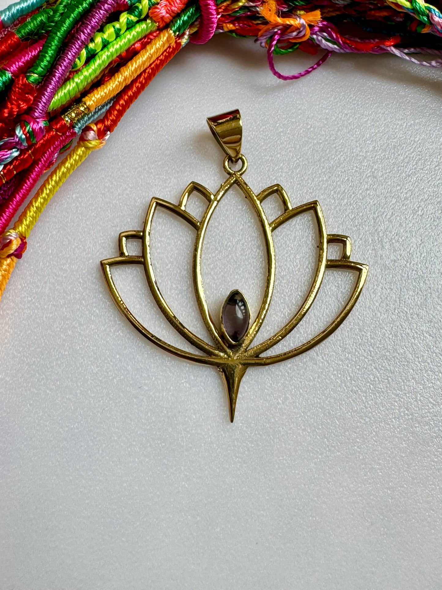 Golden necklace with amethyst lotus flower pendant