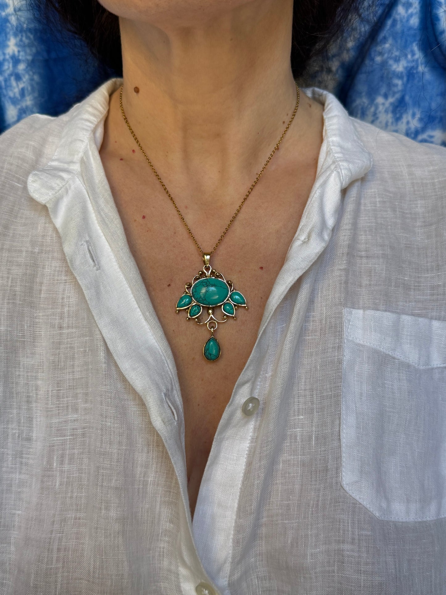 Turquoise lotus flower pendant