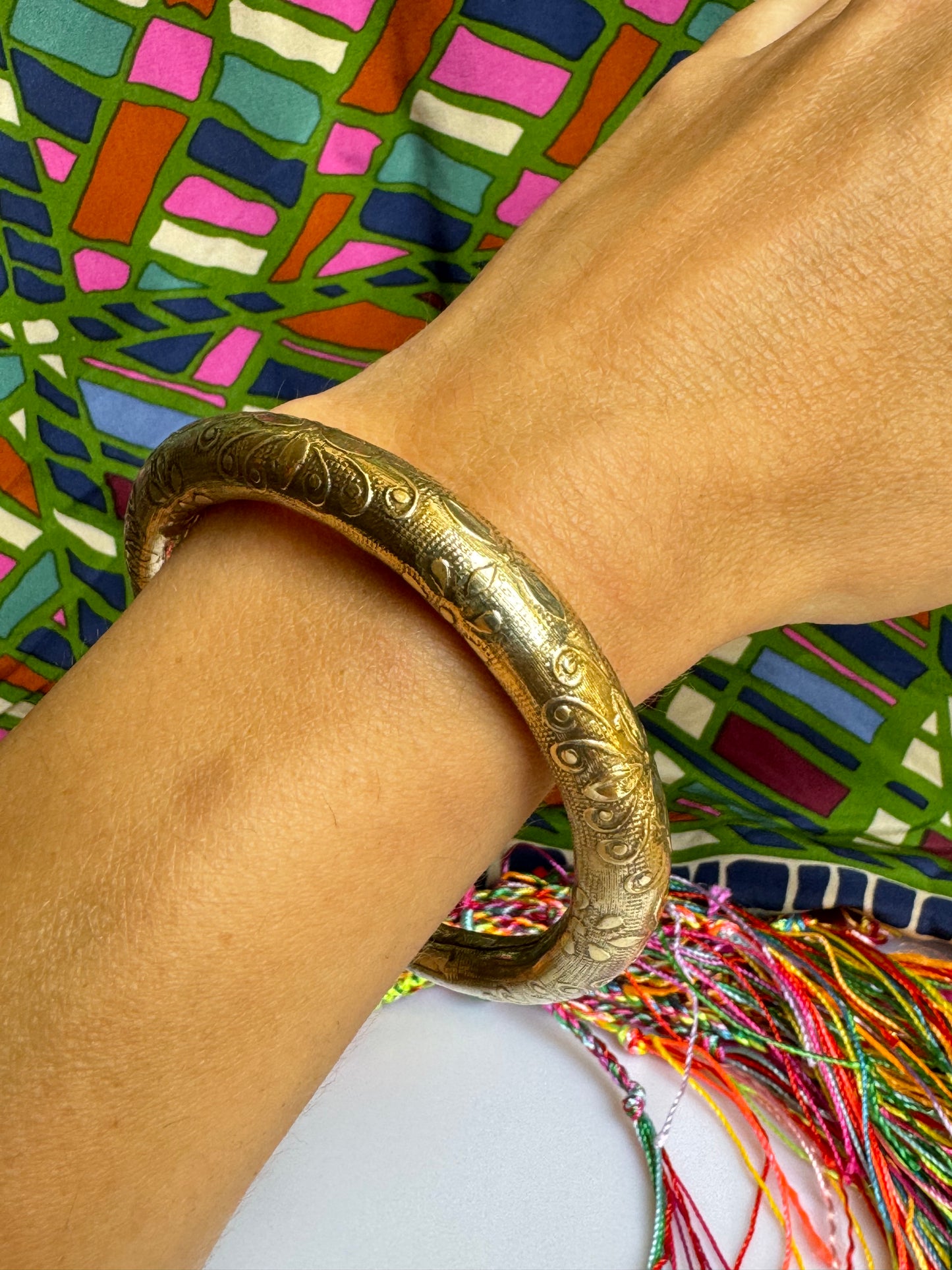 Domed golden bangle bracelet