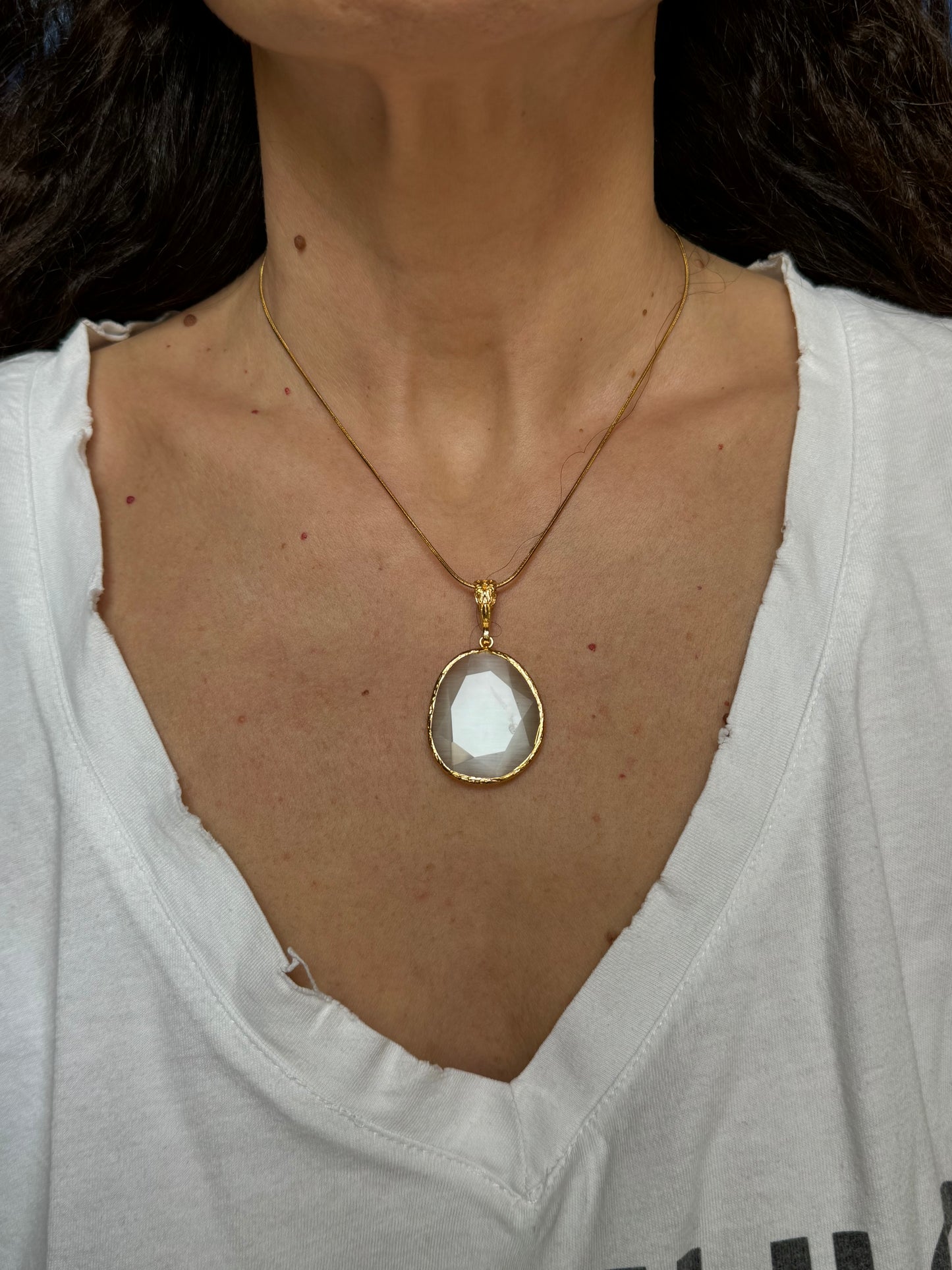 White giant drop stone pendant