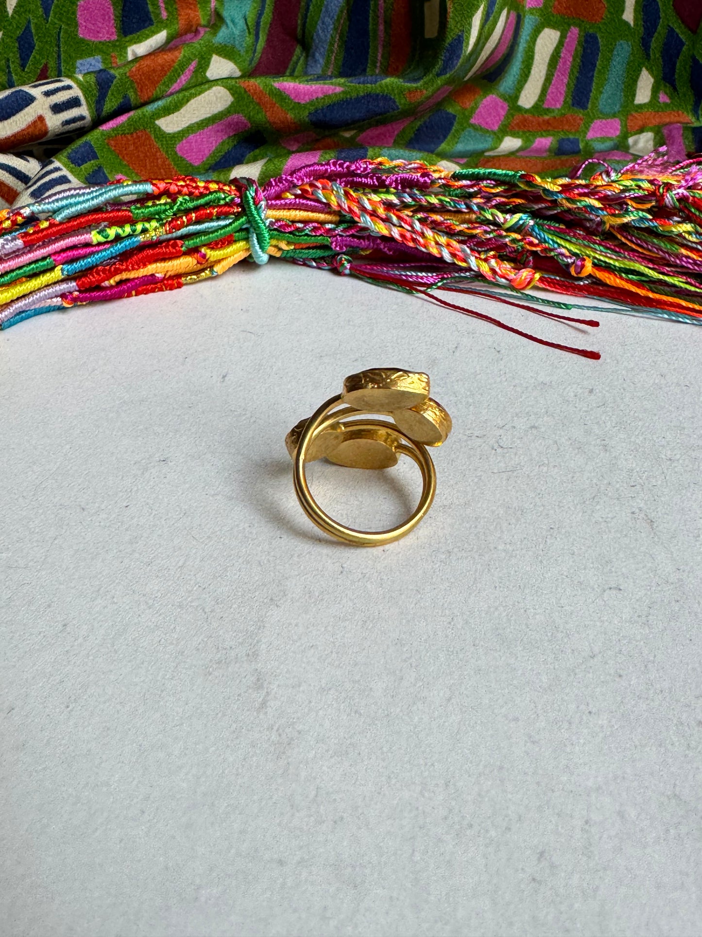 Golden ring with 4 red stones