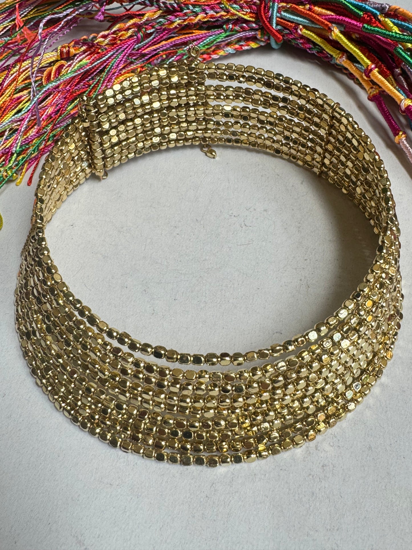 Multi-strand golden ball collar