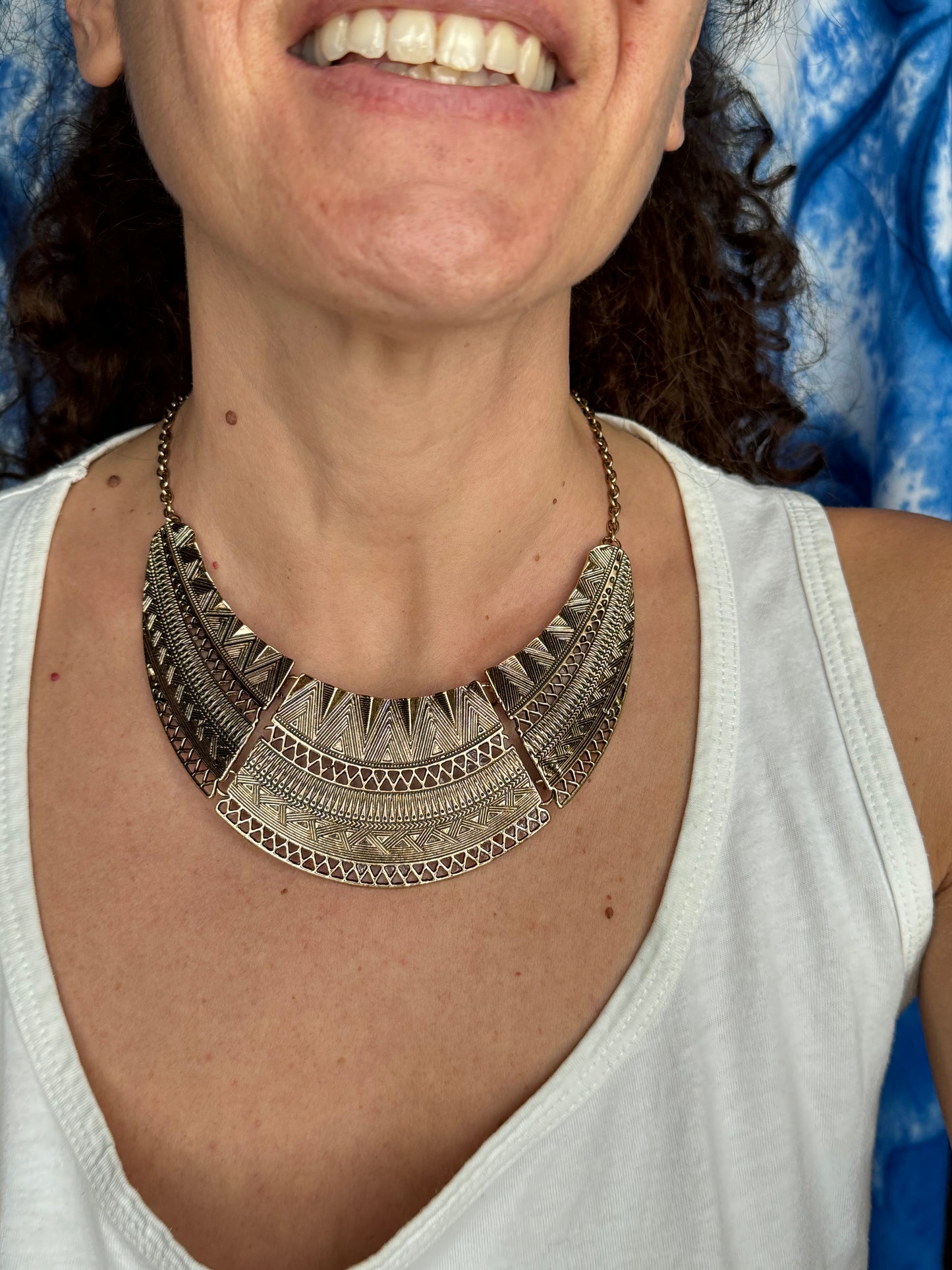 Golden engraved bib necklace