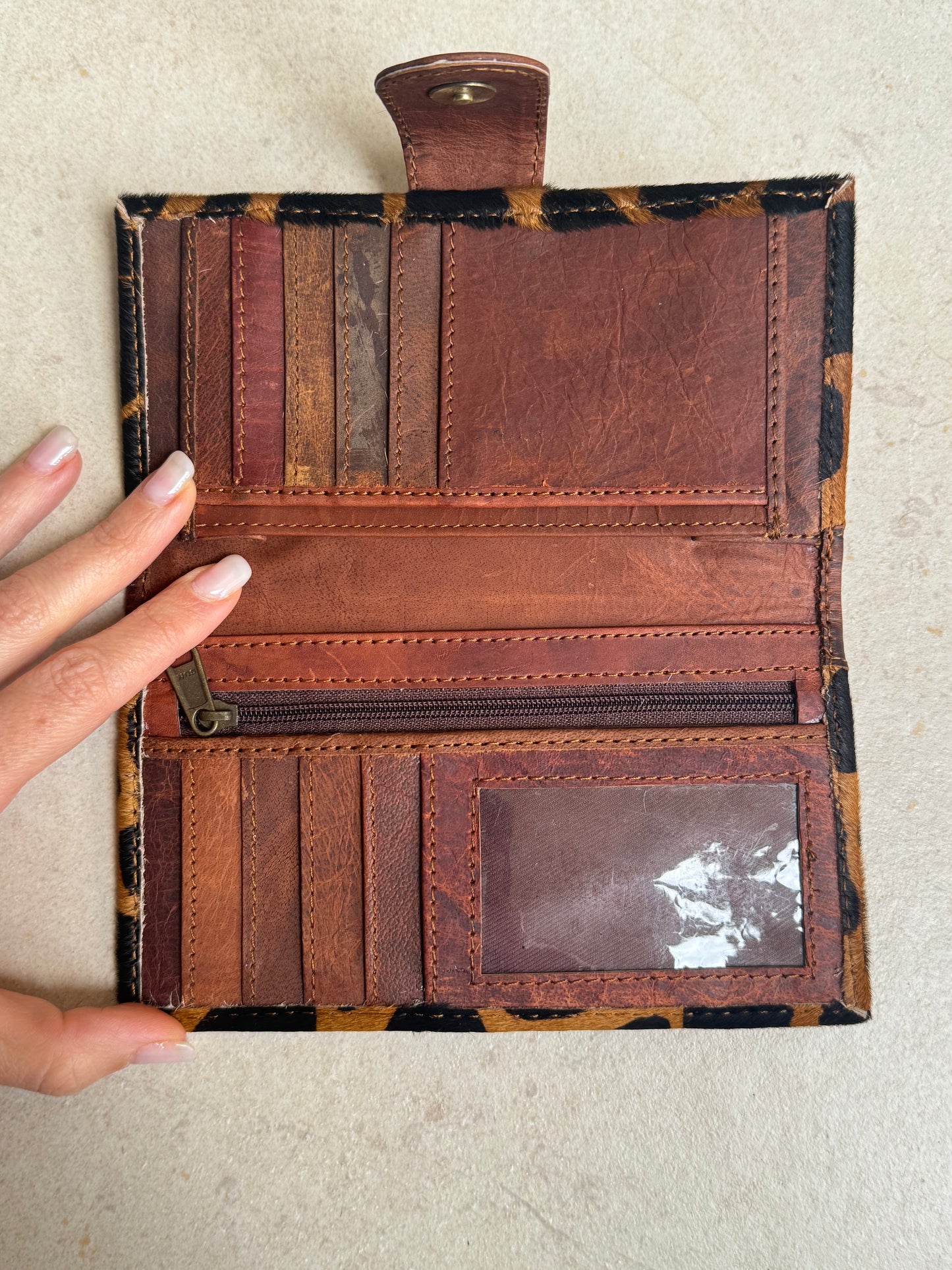 Wallet in spotted brown leather