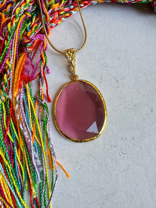 Giant pink drop stone pendant