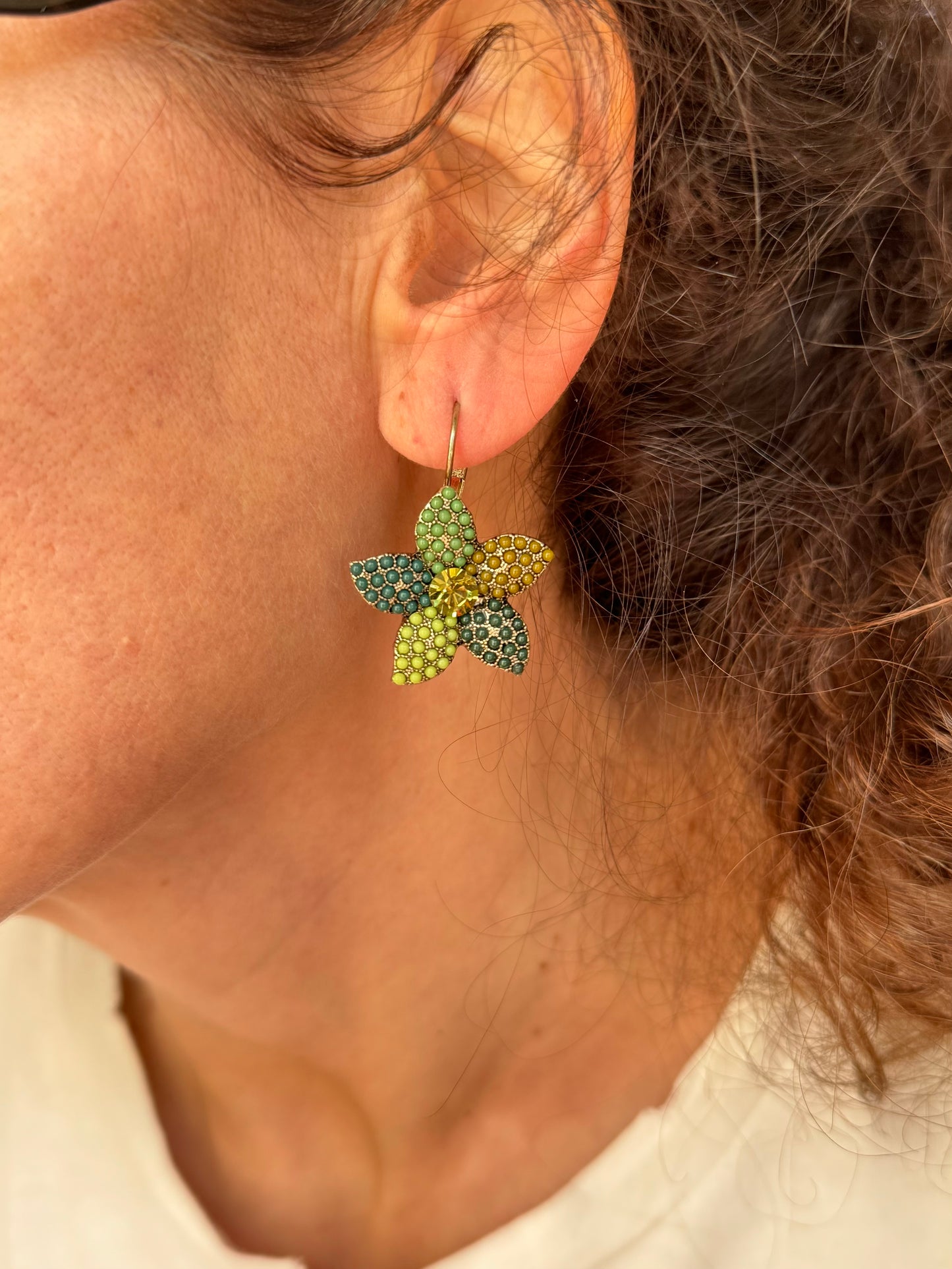 Golden green star earrings