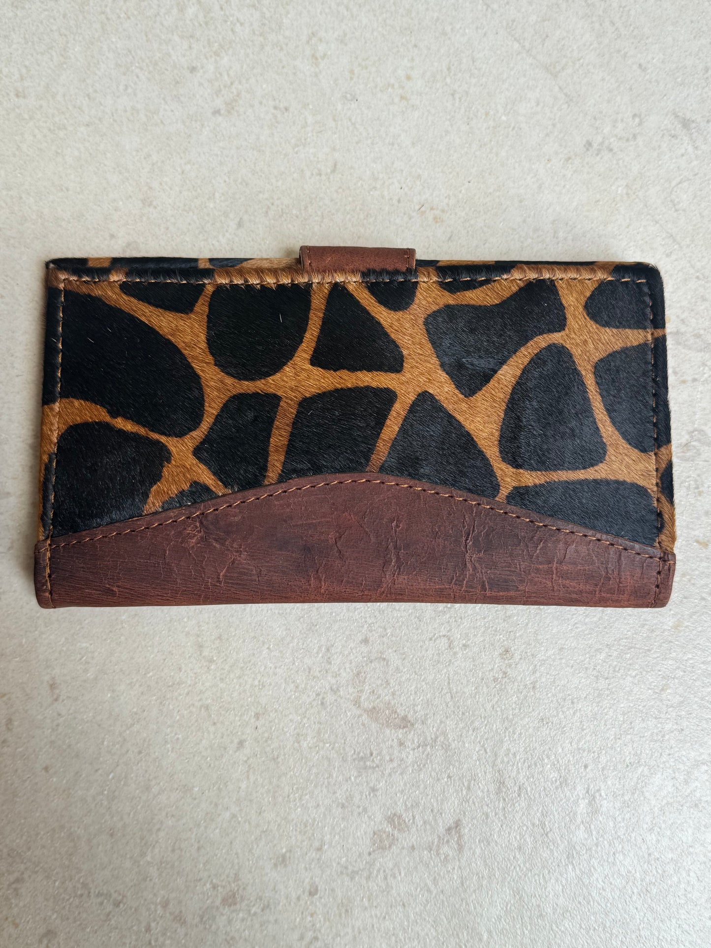 Wallet in spotted brown leather