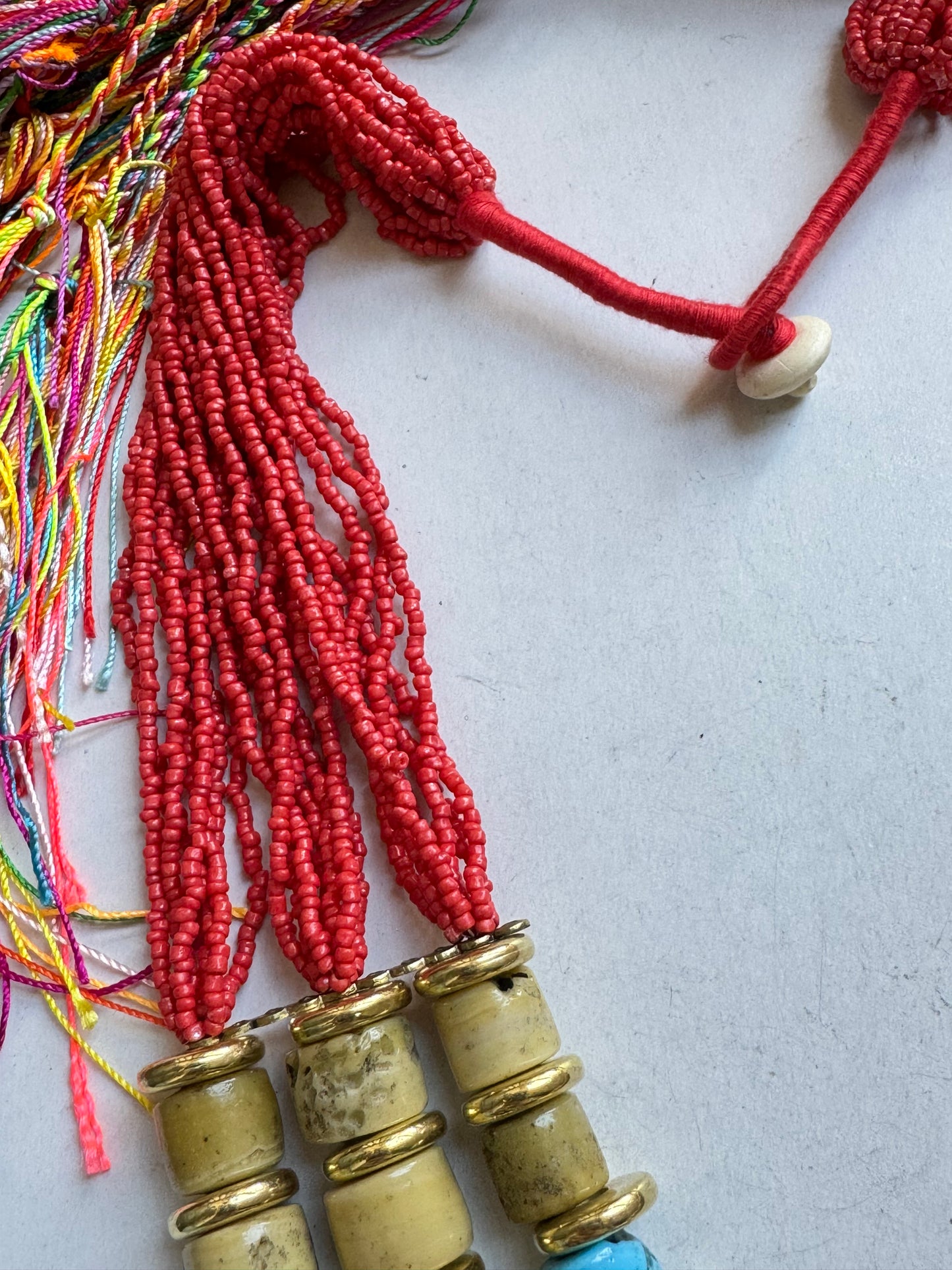 Multi-strand red beaded necklace