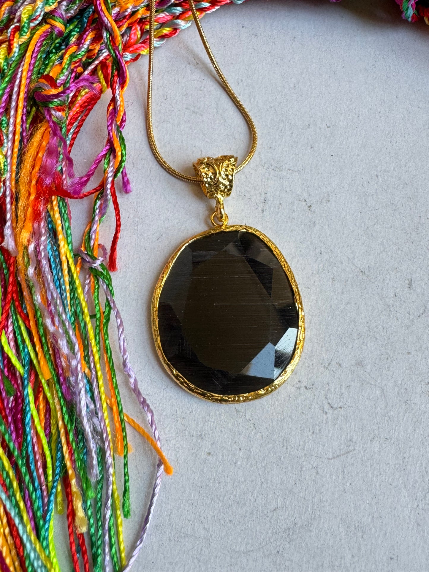 Giant black drop stone pendant