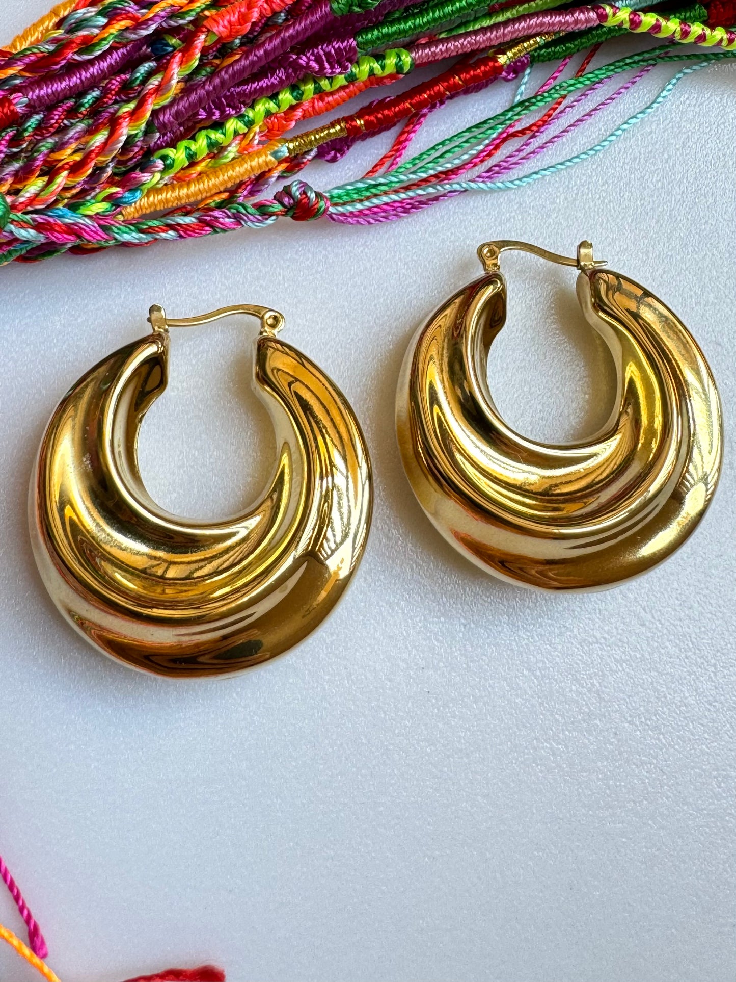 Spiral gold steel earrings