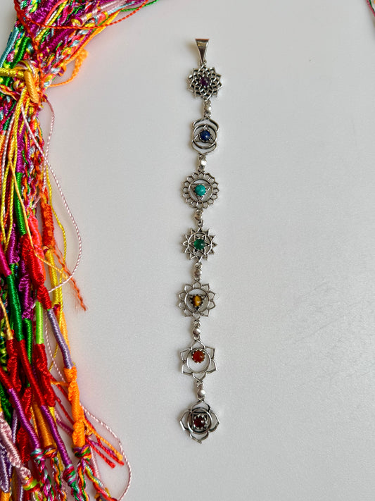 Silver necklace with seven chakra symbols and colors pendant