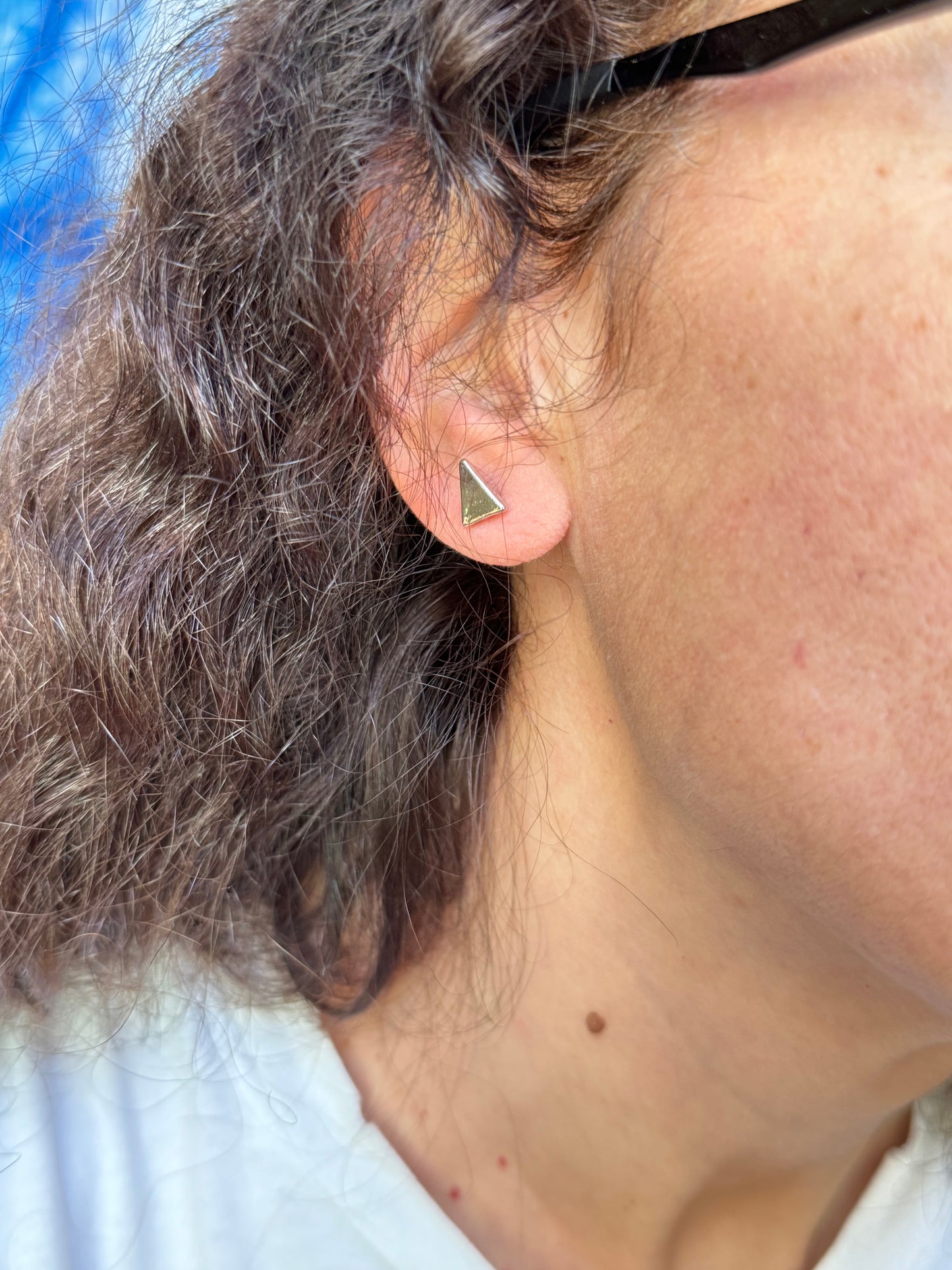 Silver pendant earrings of different lengths