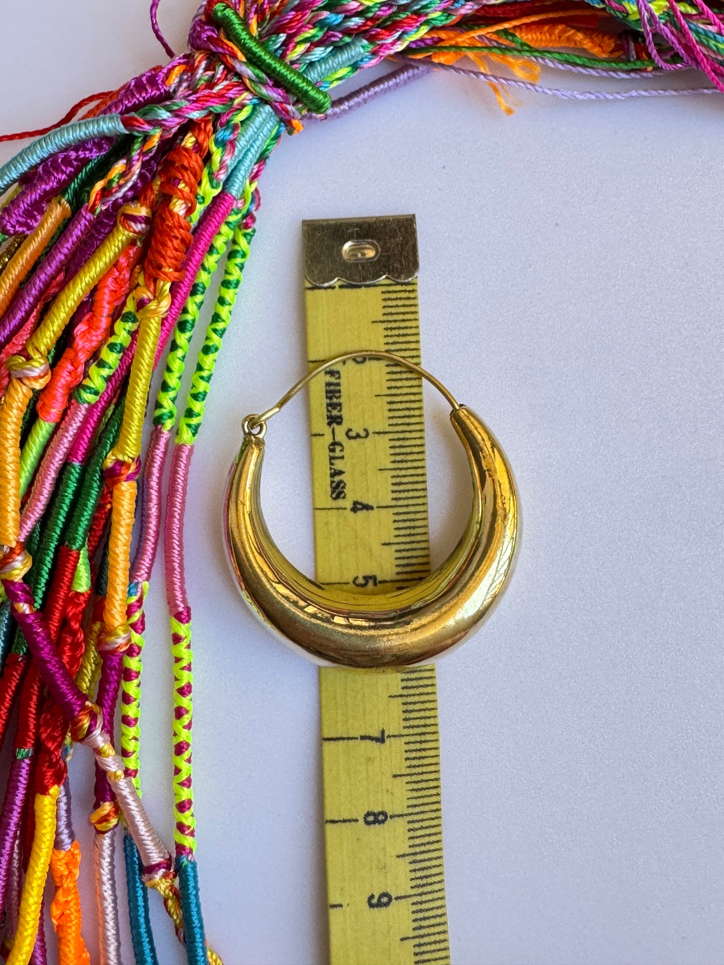 Large rounded golden boho earrings