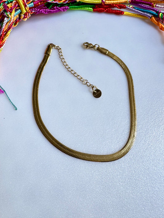 Cavigliera snake acciao dorato doppio